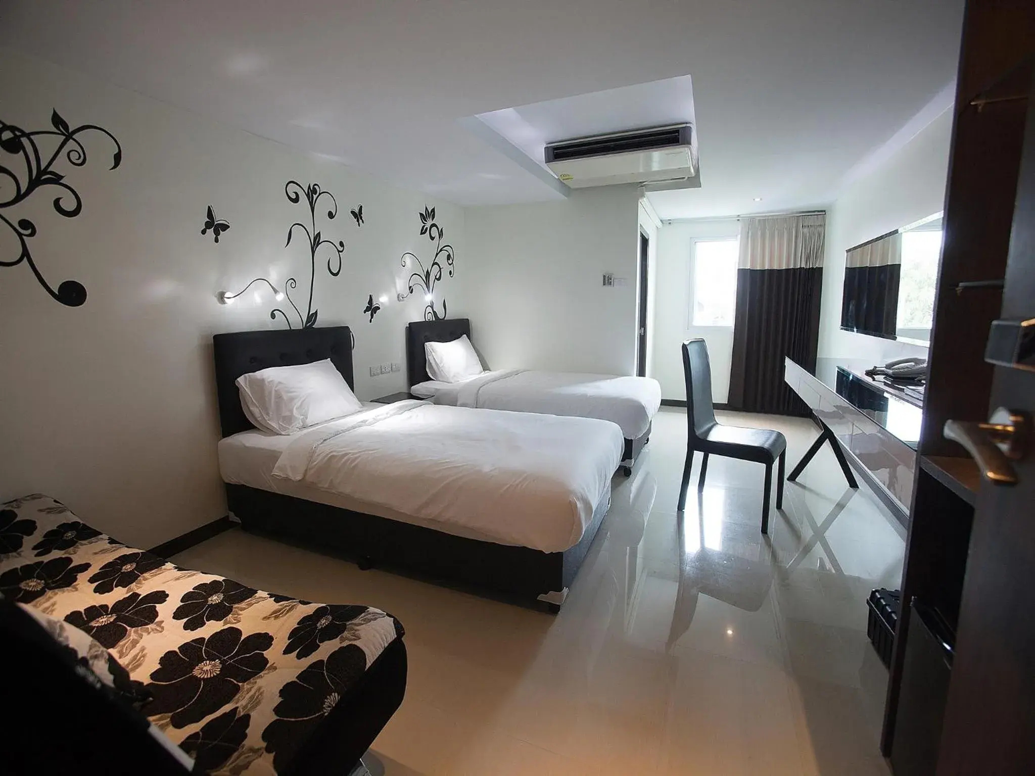 Photo of the whole room in MD Grand Hotel Nakhon Photo of the whole room in MD Grand Hotel Nakhon