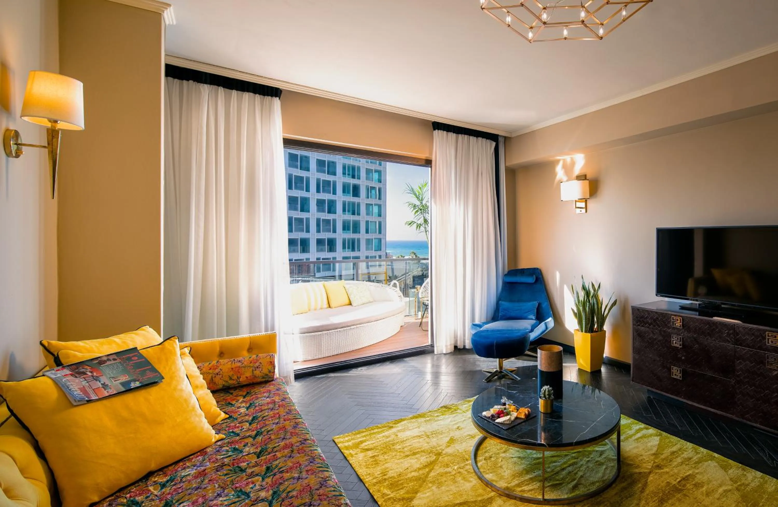 Living room, Bed in Brown Beach House Tel-Aviv, a member of Brown Hotels