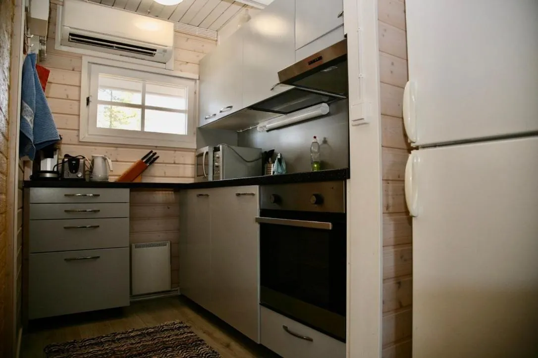 Kitchen or kitchenette in Lossisaari Tourist Center