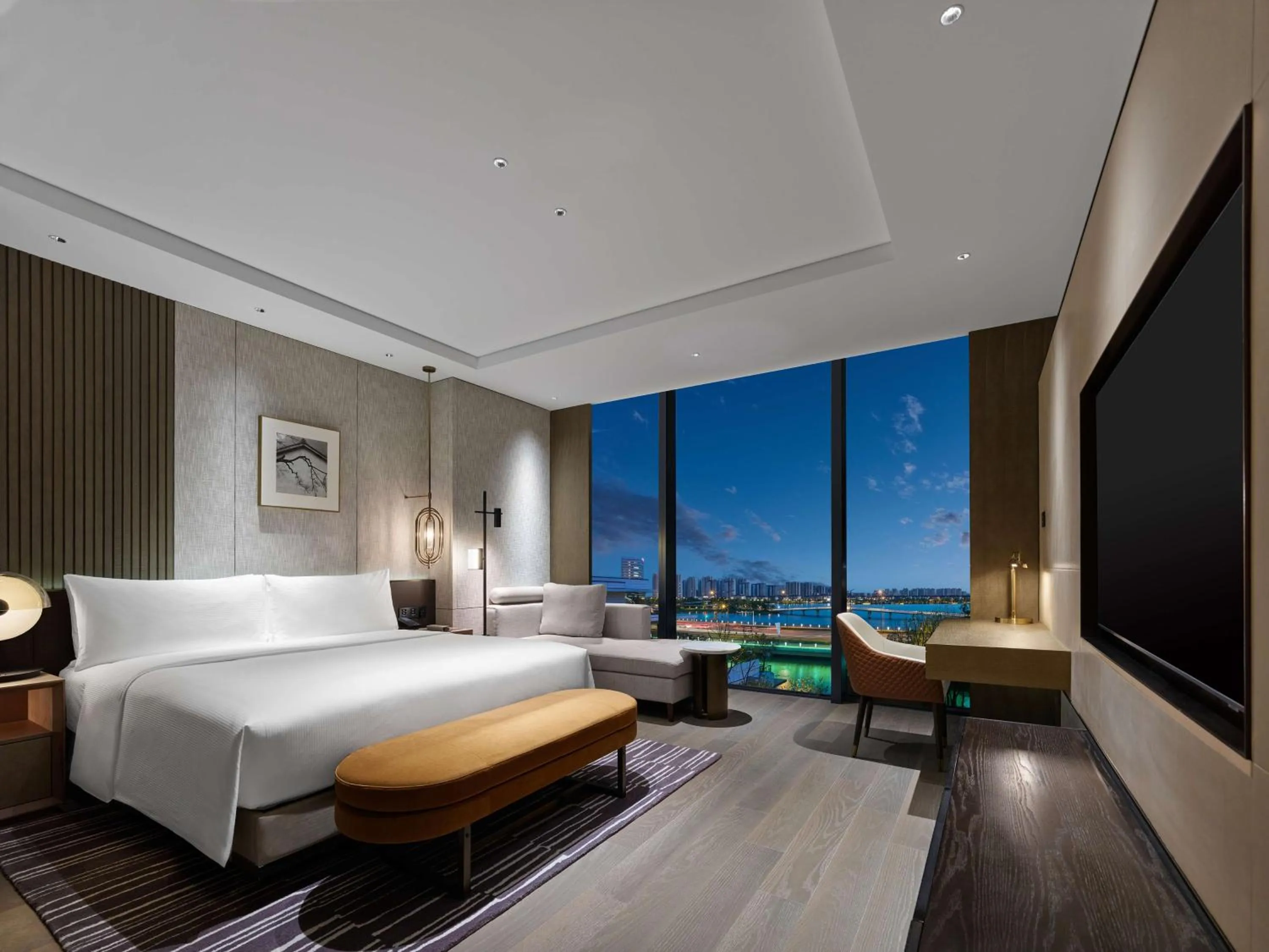 Living room, Bed in Hilton Changshu