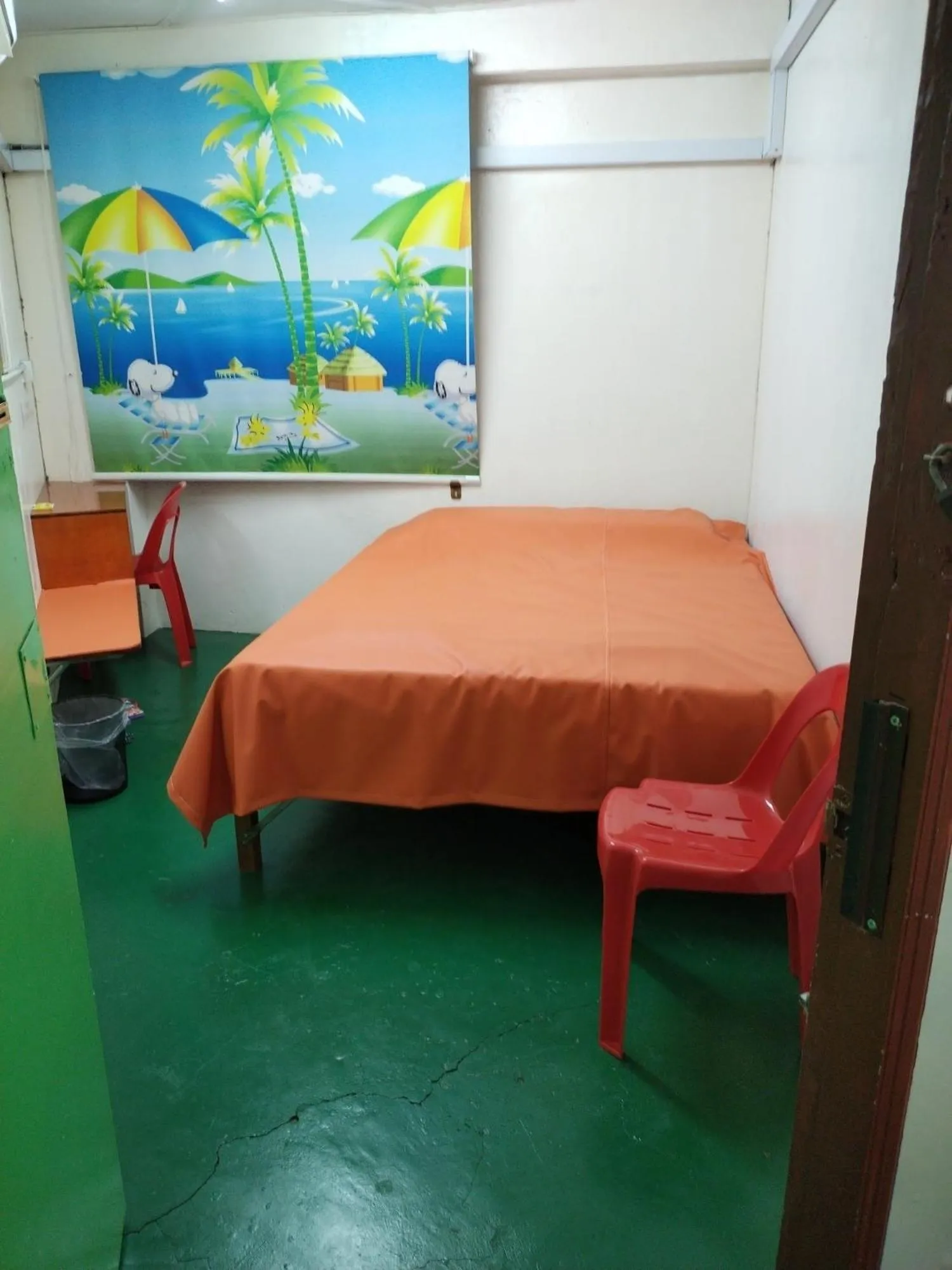 Photo of the whole room, Bed in WISMA ORCHID HOMESTAY Tuaran