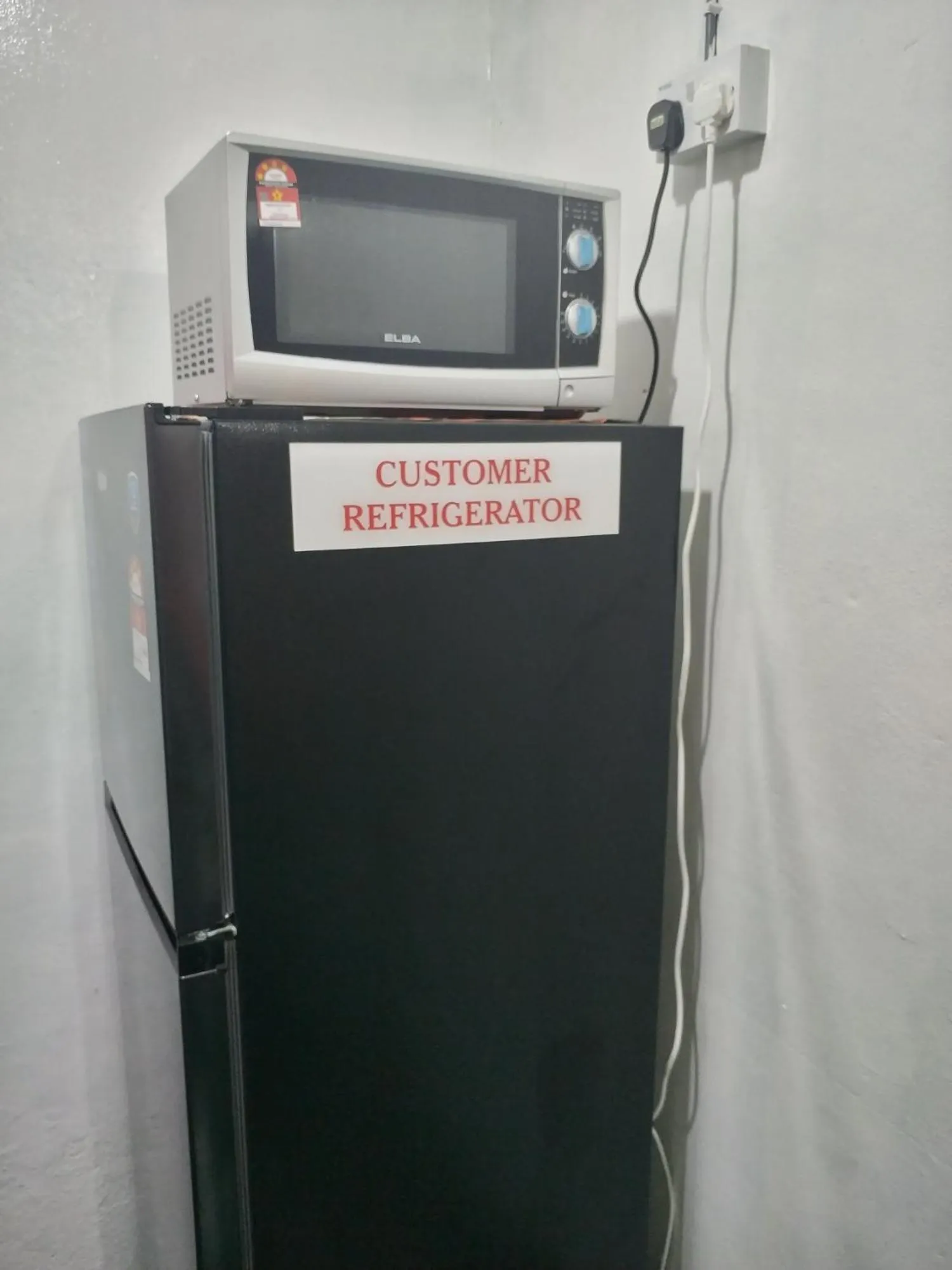 oven in WISMA ORCHID HOMESTAY Tuaran