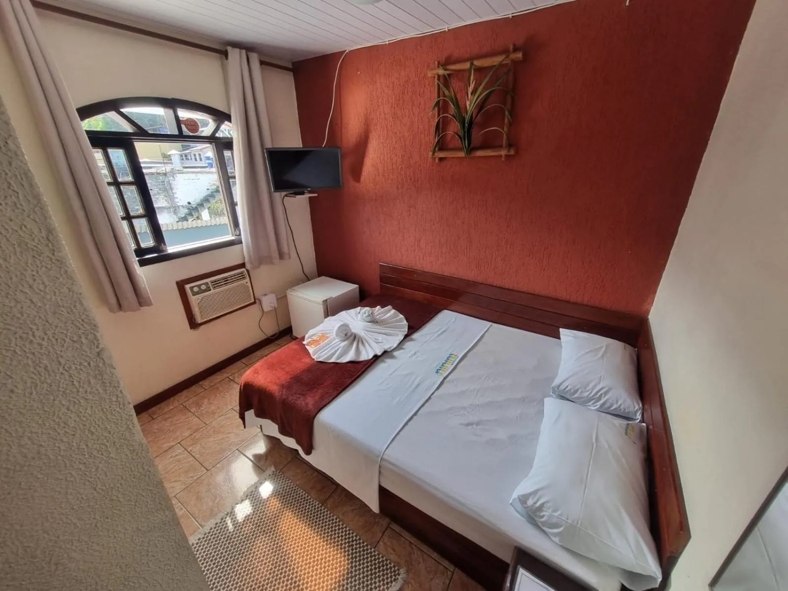 Bed in Pousada Tuiuiu