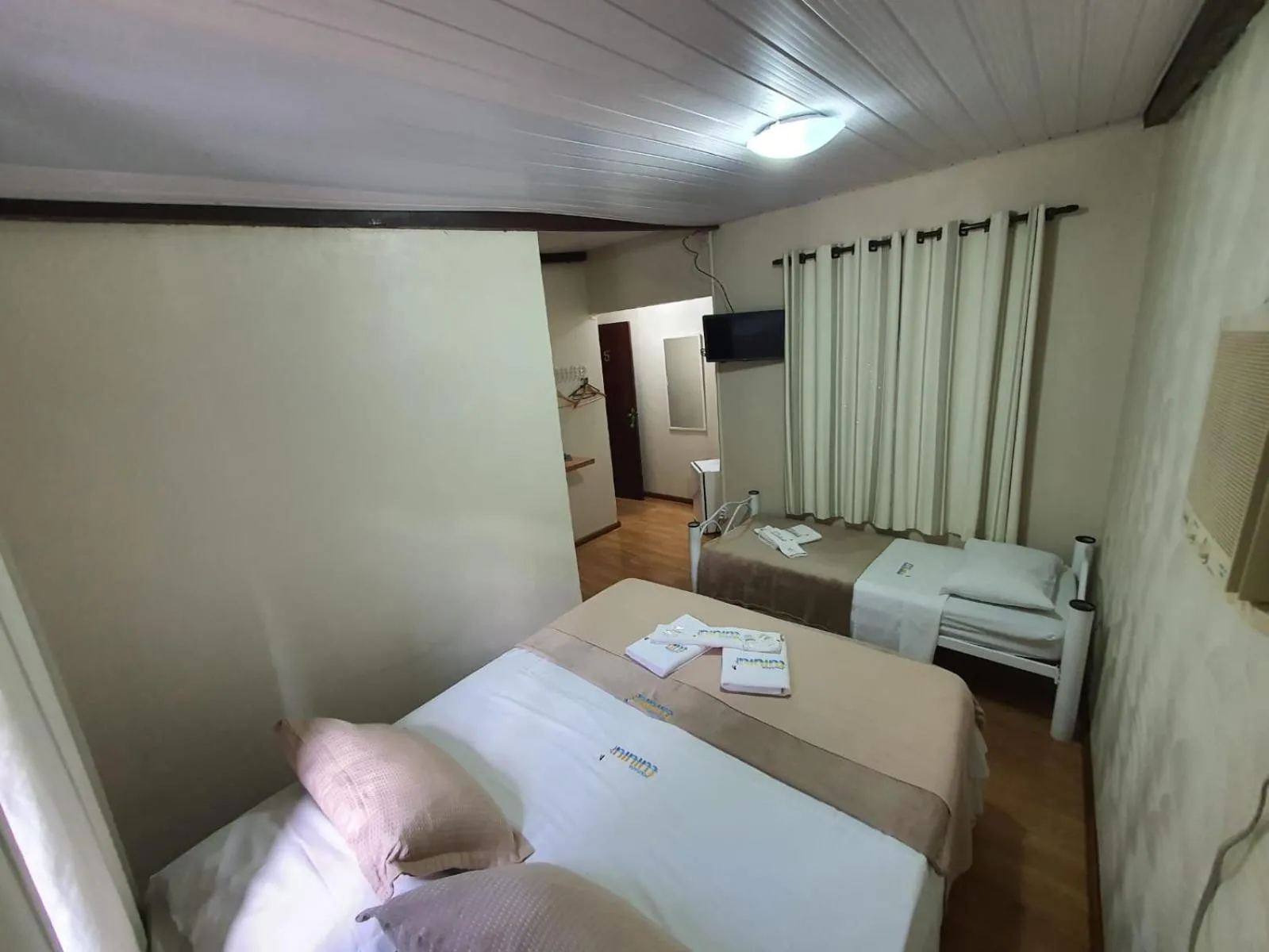 Bed in Pousada Tuiuiu