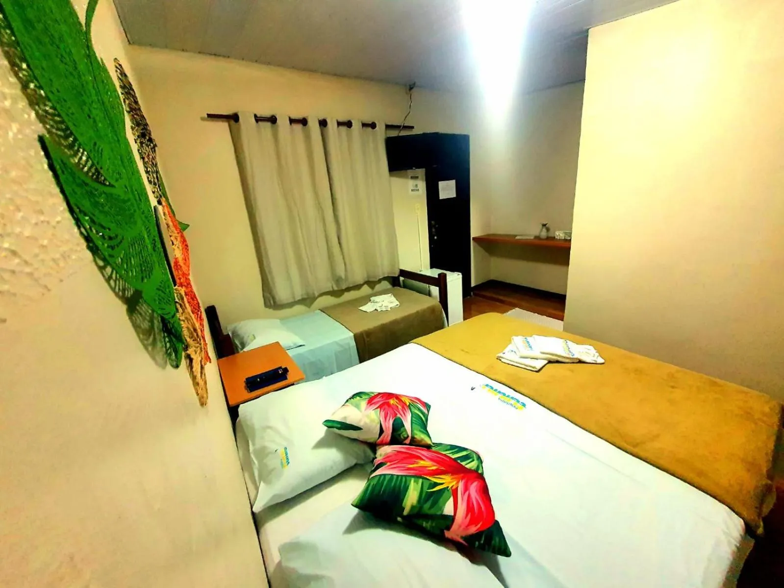 Bed in Pousada Tuiuiu