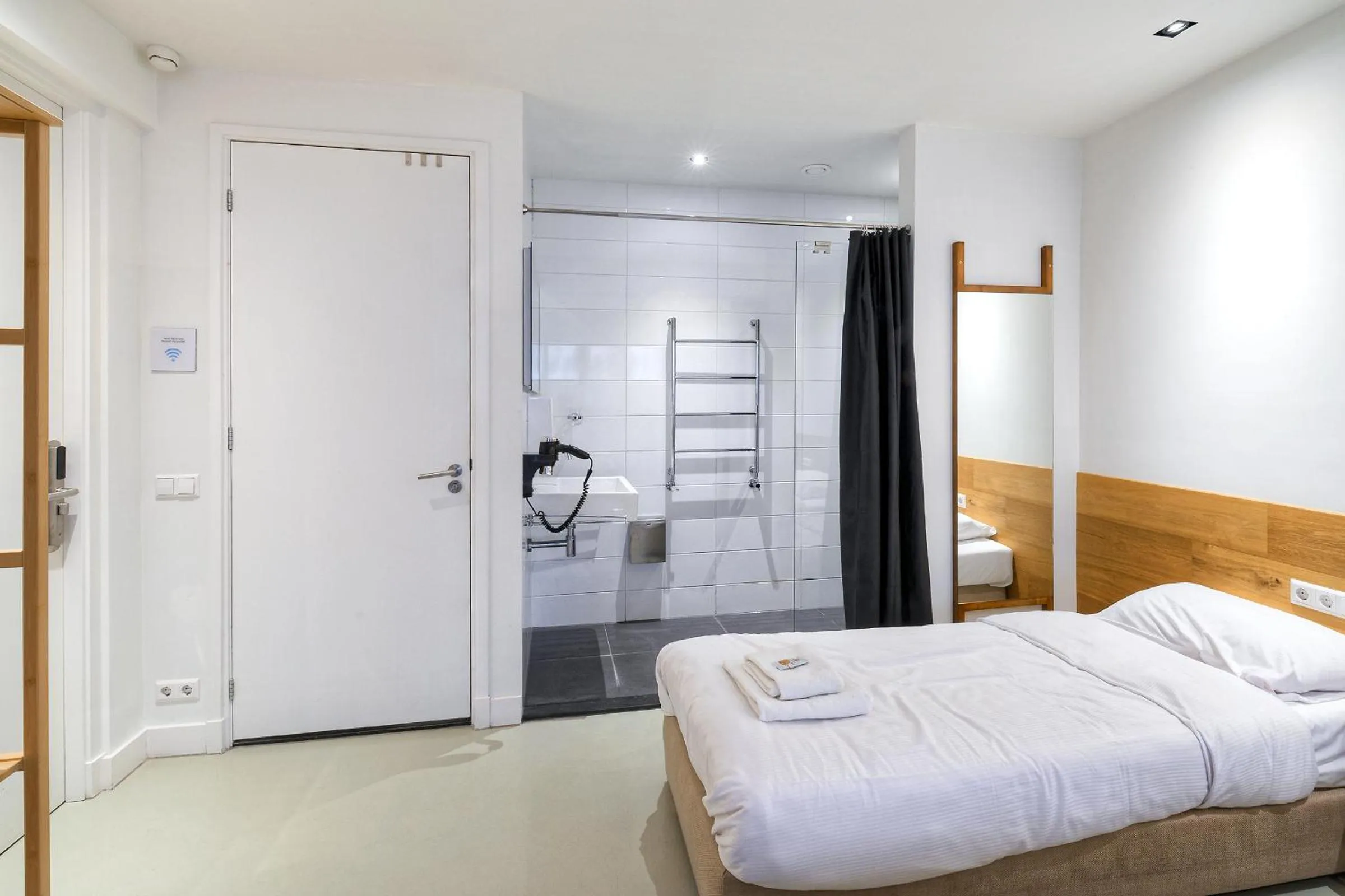 Bed in Marnix360apartments The Mansion Suites