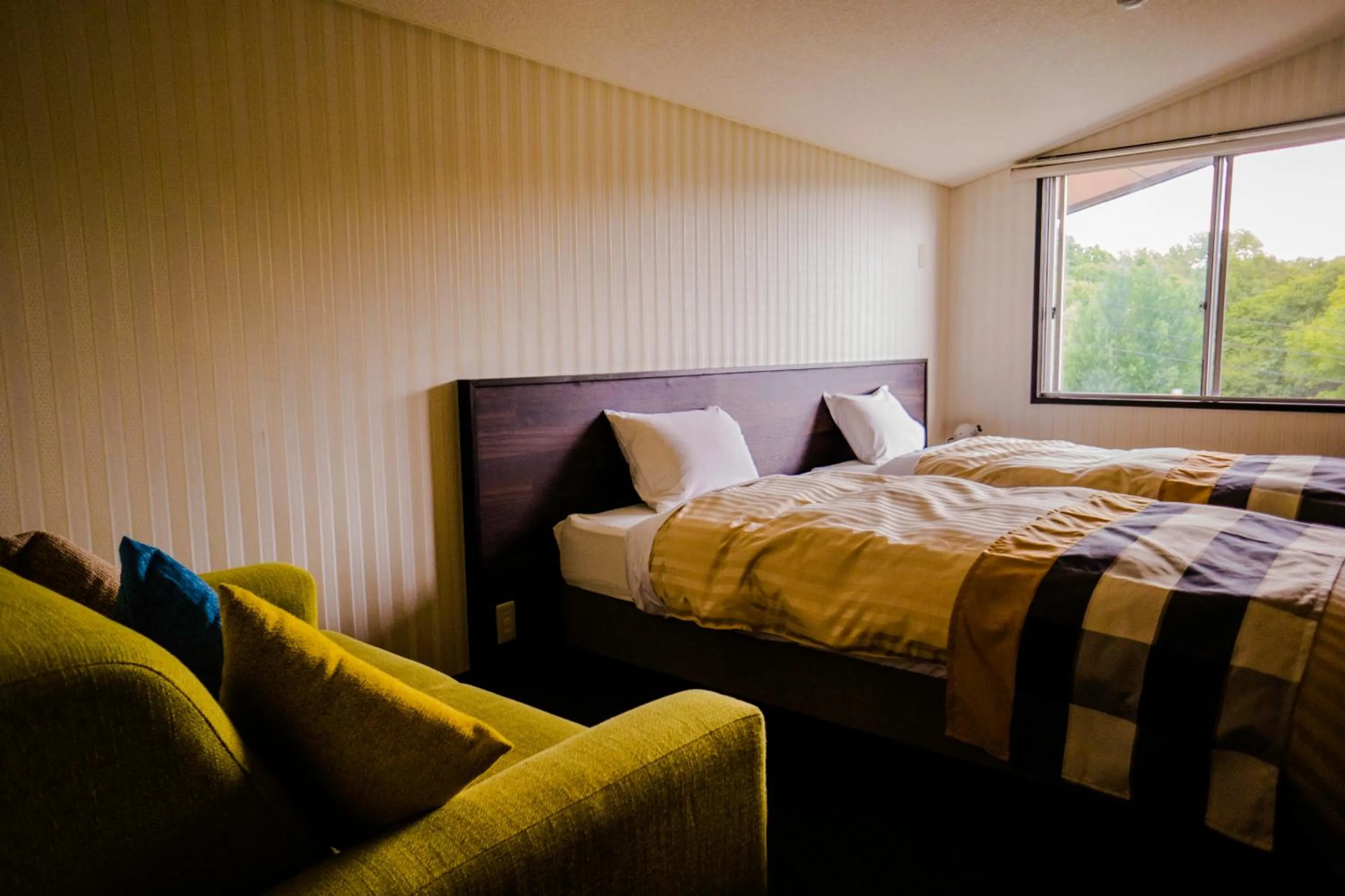 Bed in Hotel Hakuba Berghaus