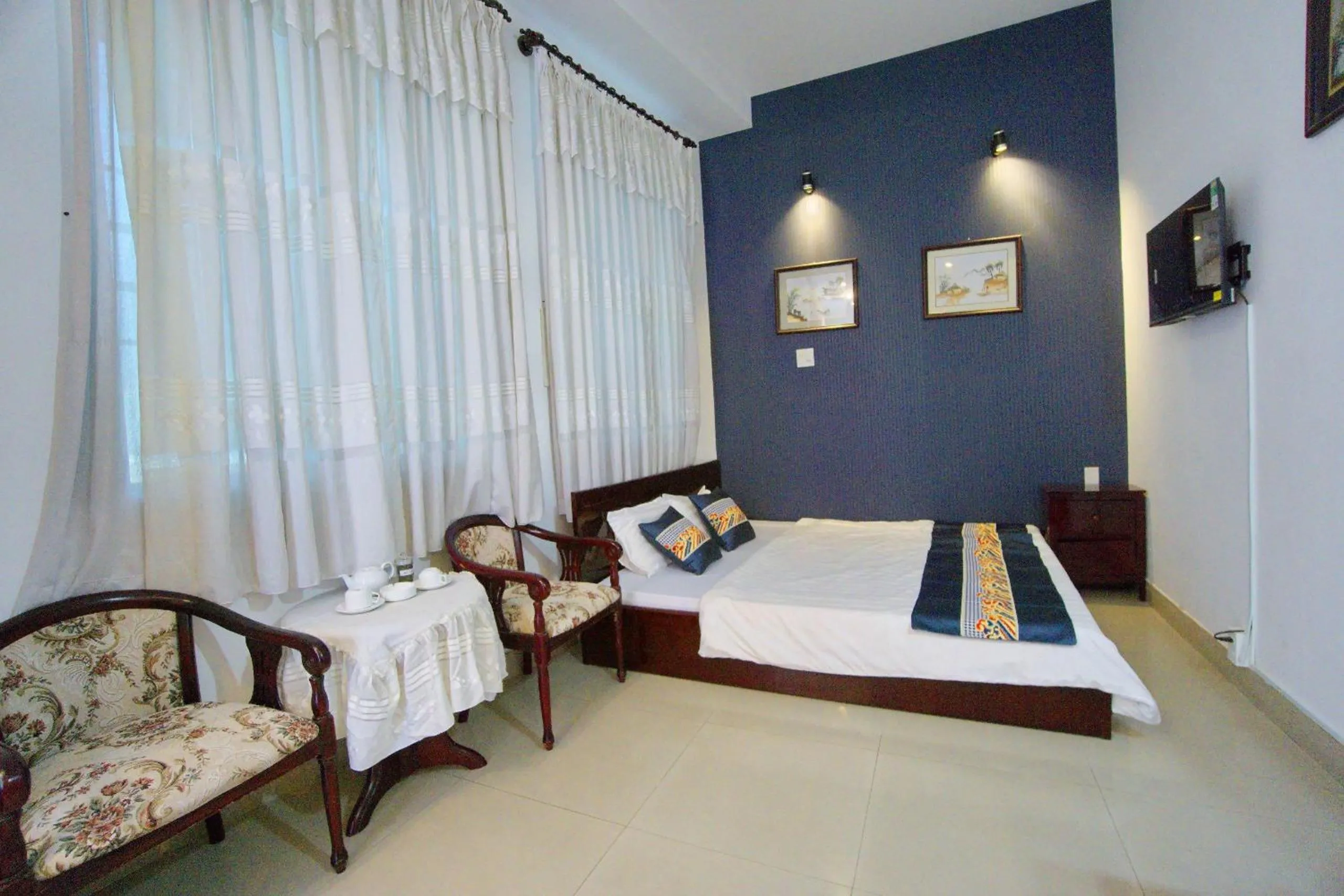 Photo of the whole room, Bed in Hotel Hải Châu