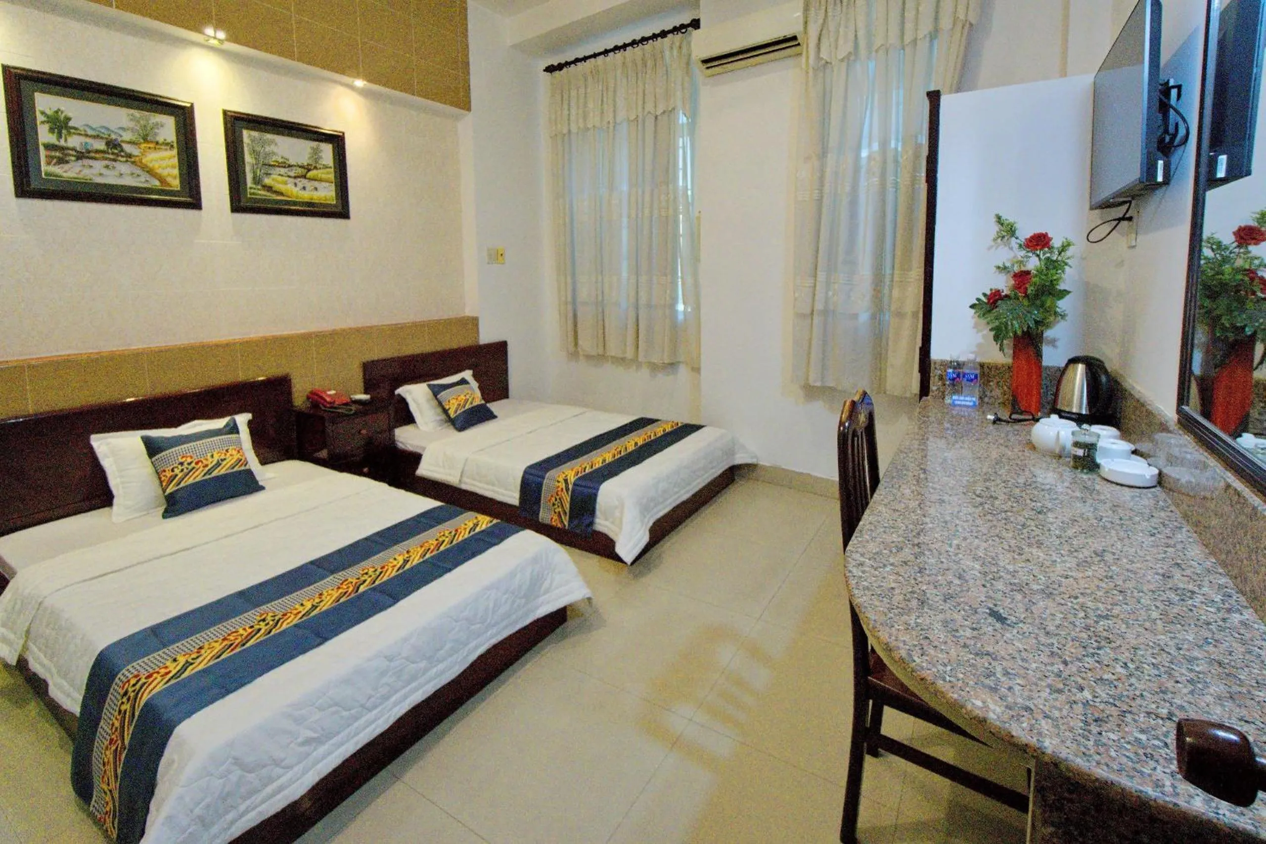 Photo of the whole room, Bed in Hotel Hải Châu