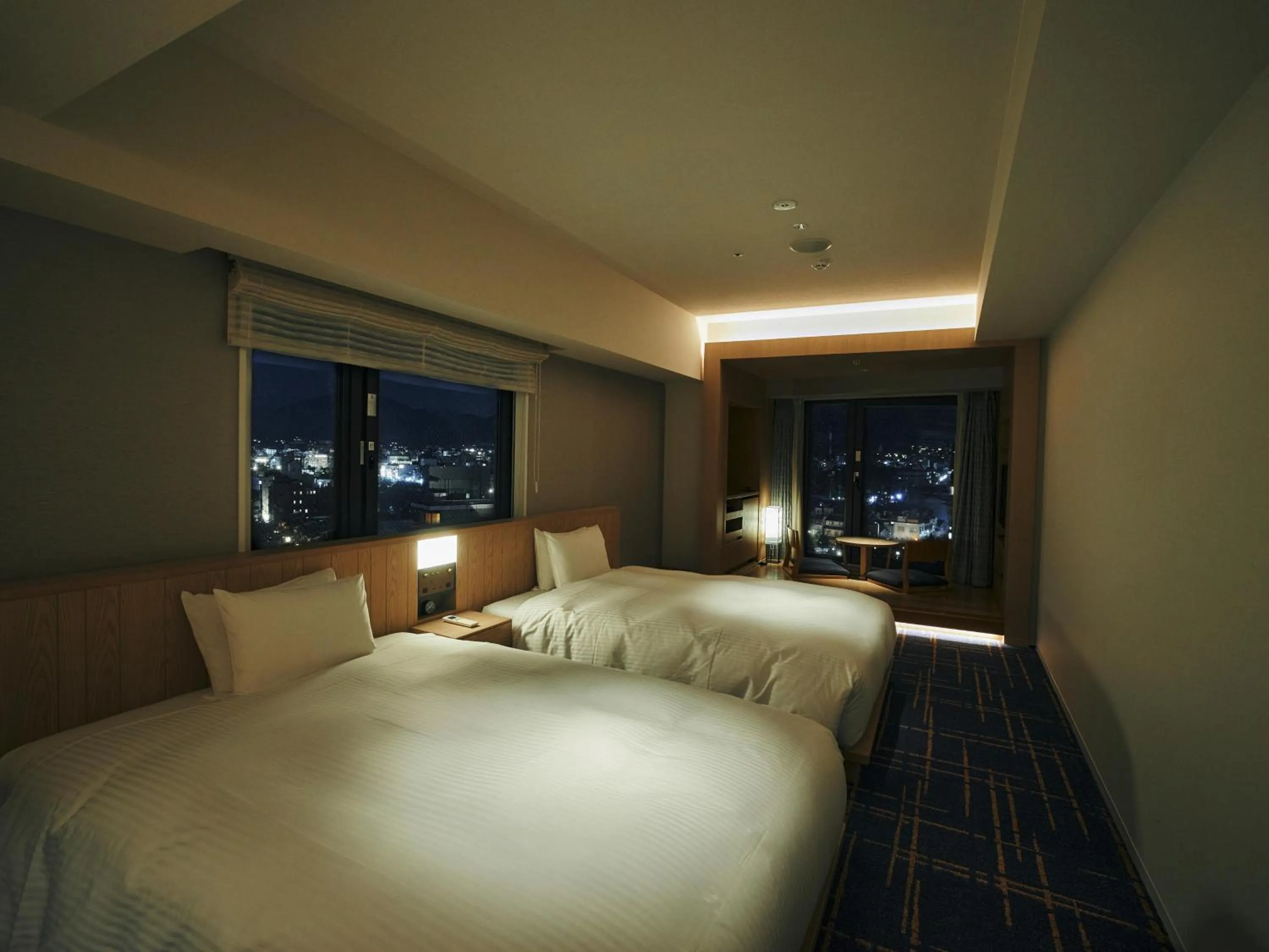 Bed in Hotel Traveltine Kyoto Kiyamachi