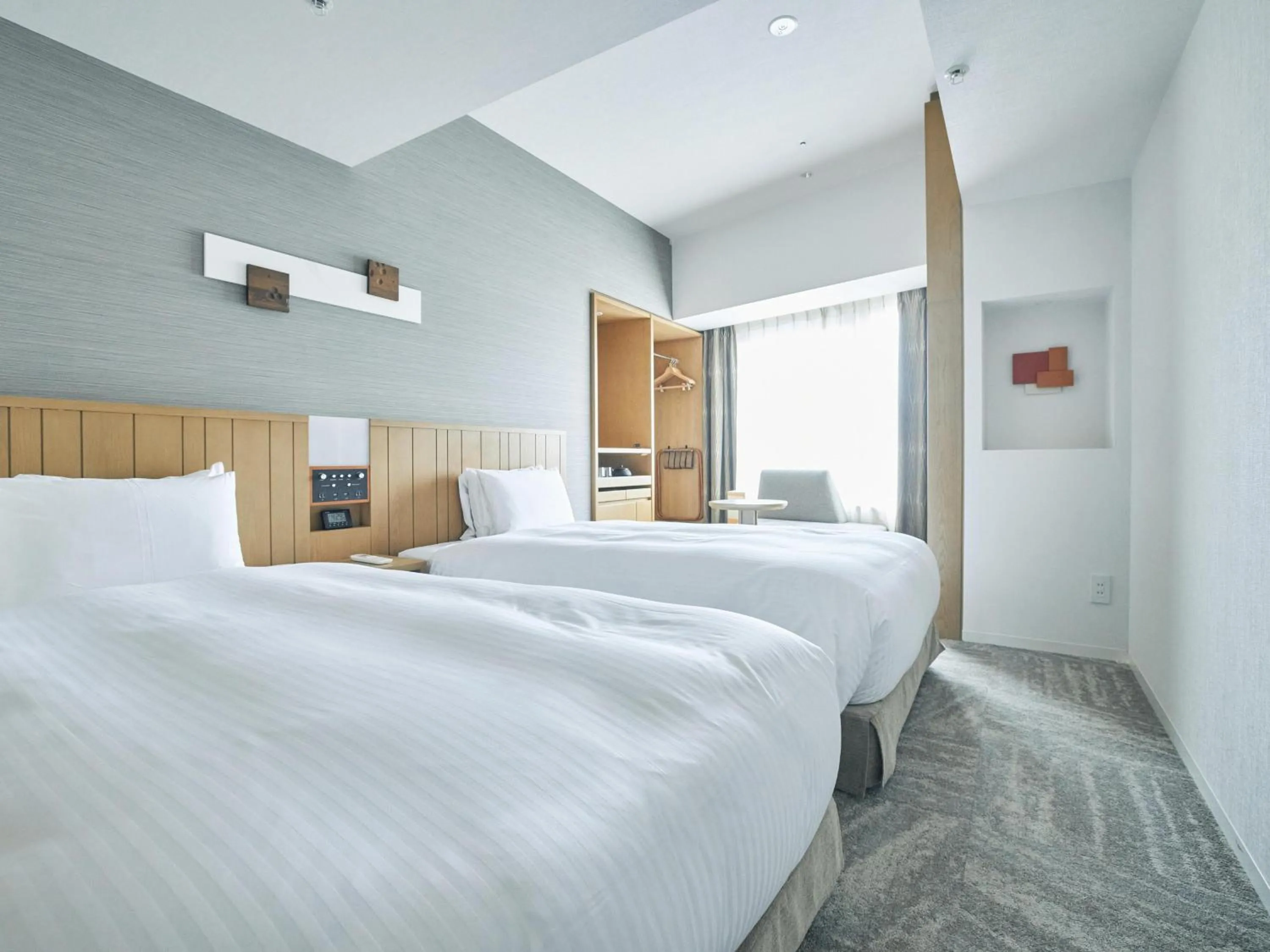 Bed in Hotel Traveltine Kyoto Kiyamachi