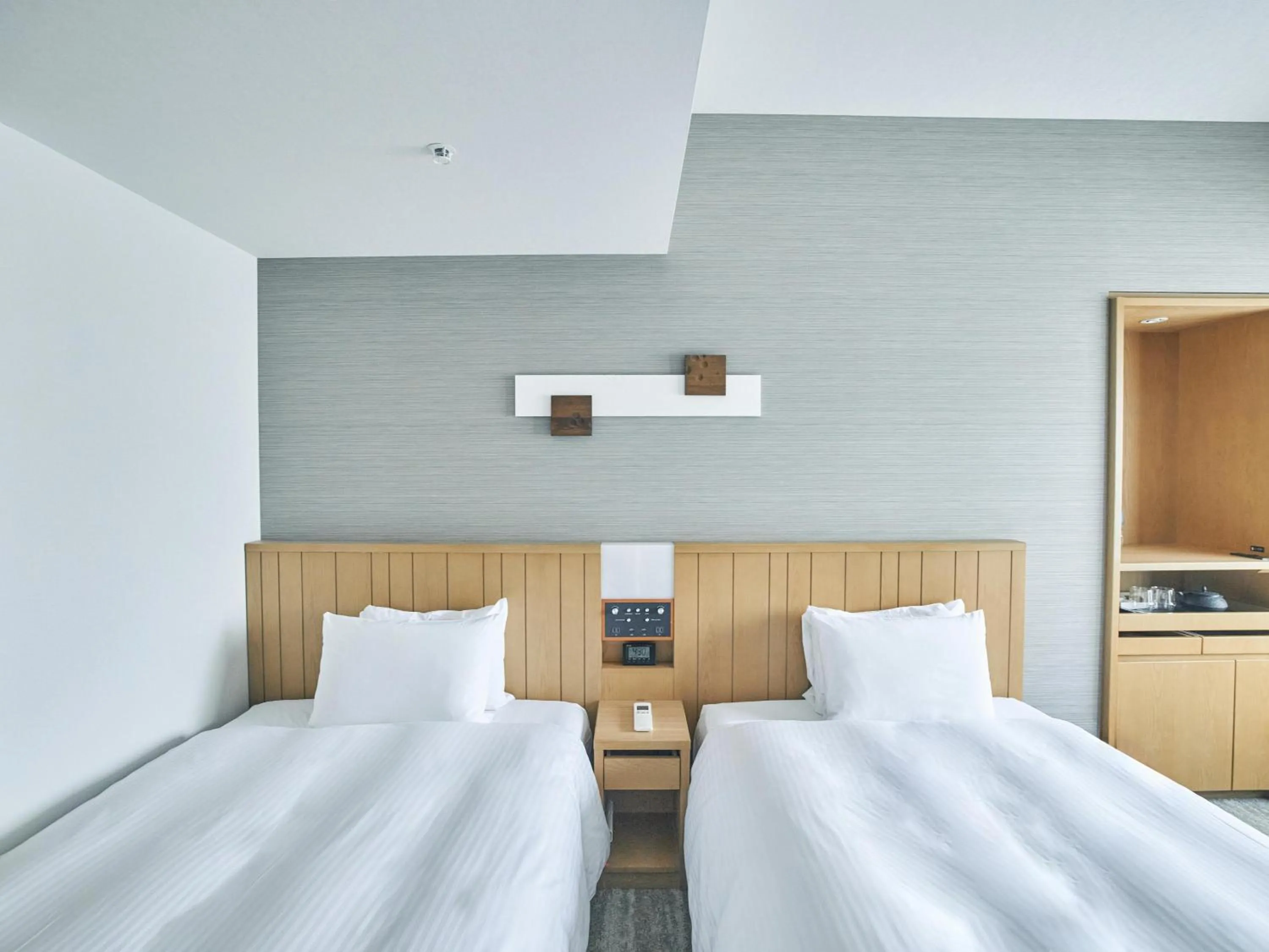 Bed in Hotel Traveltine Kyoto Kiyamachi