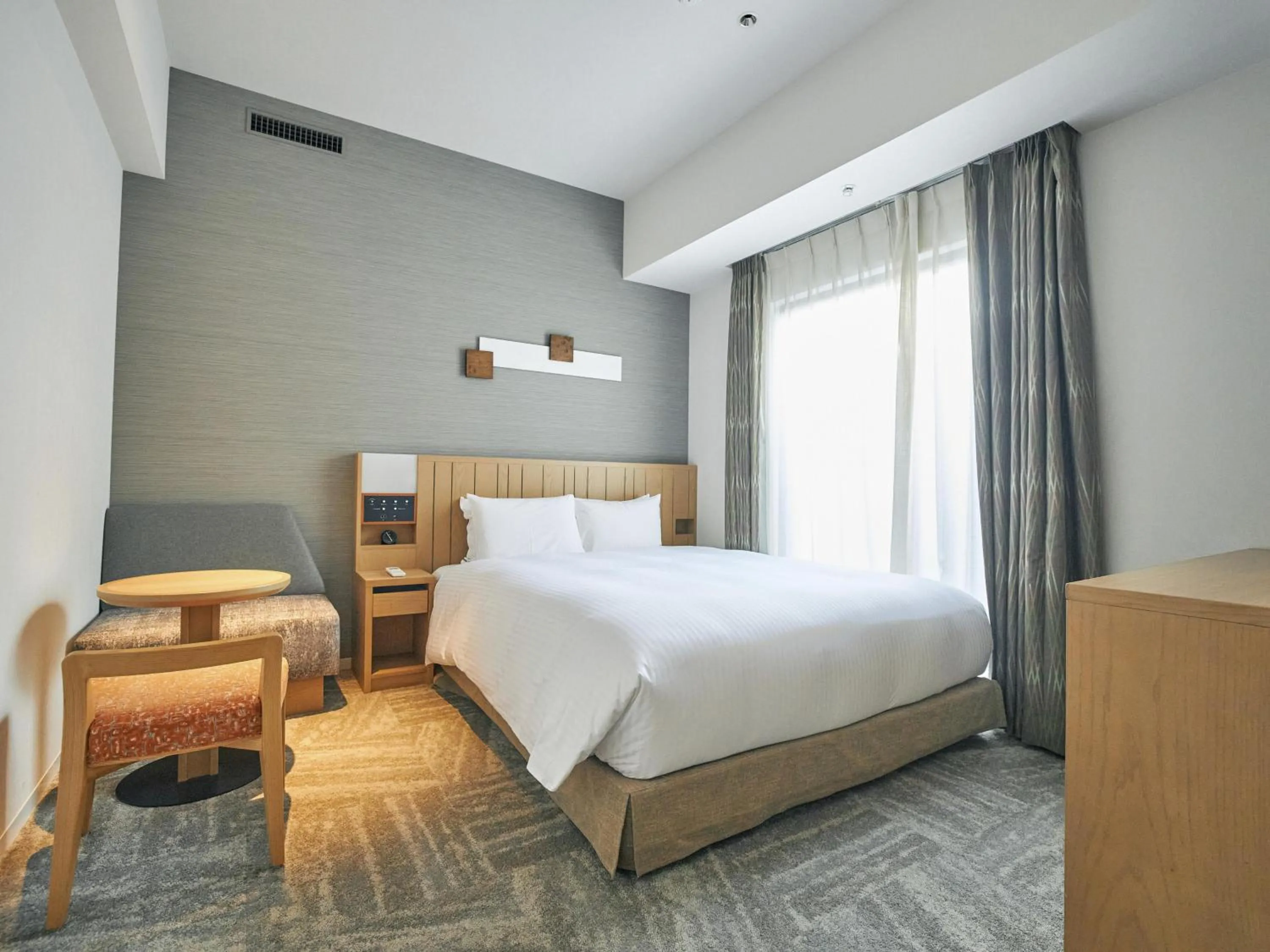 Bed in Hotel Traveltine Kyoto Kiyamachi