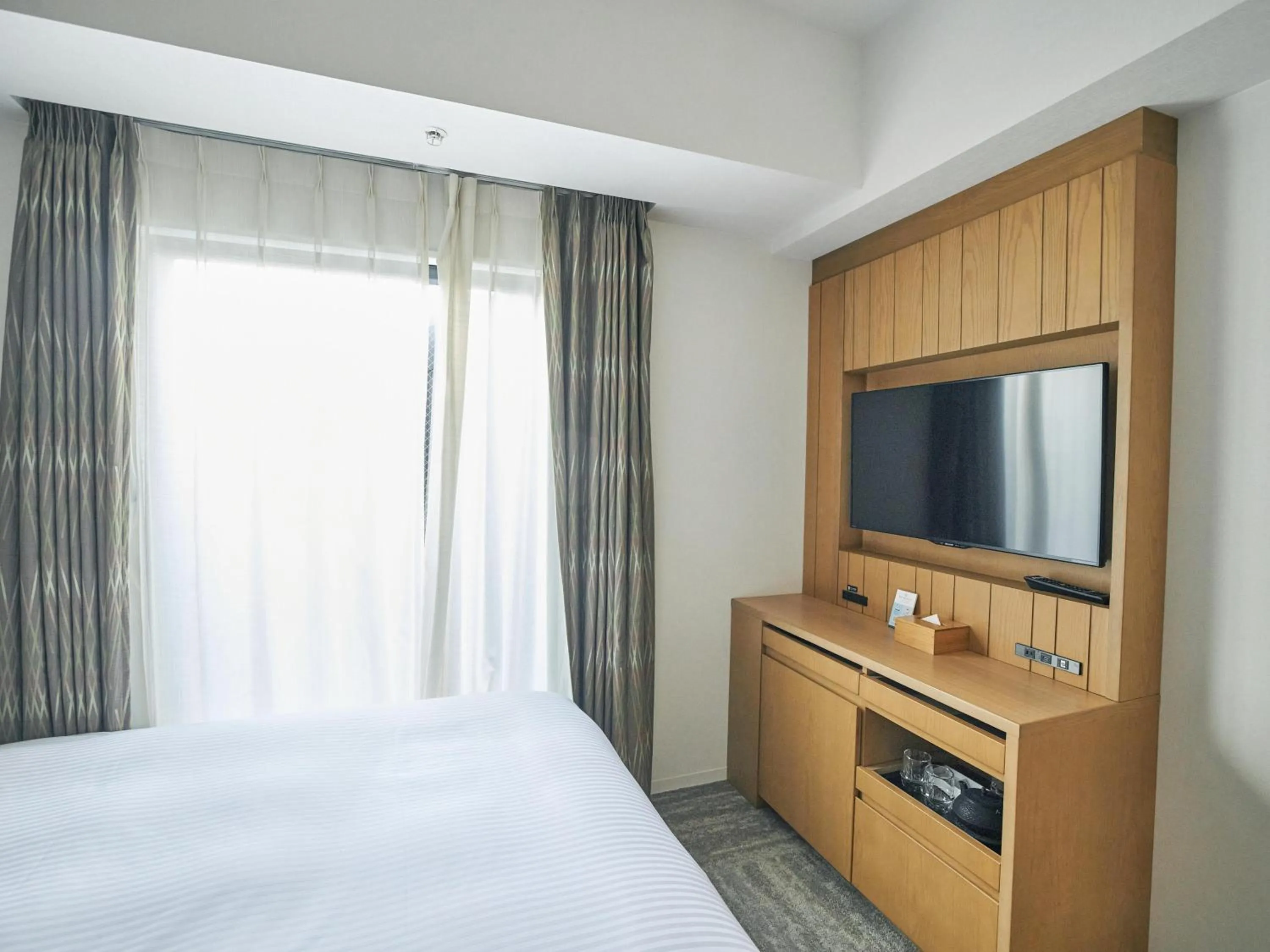 Bed in Hotel Traveltine Kyoto Kiyamachi