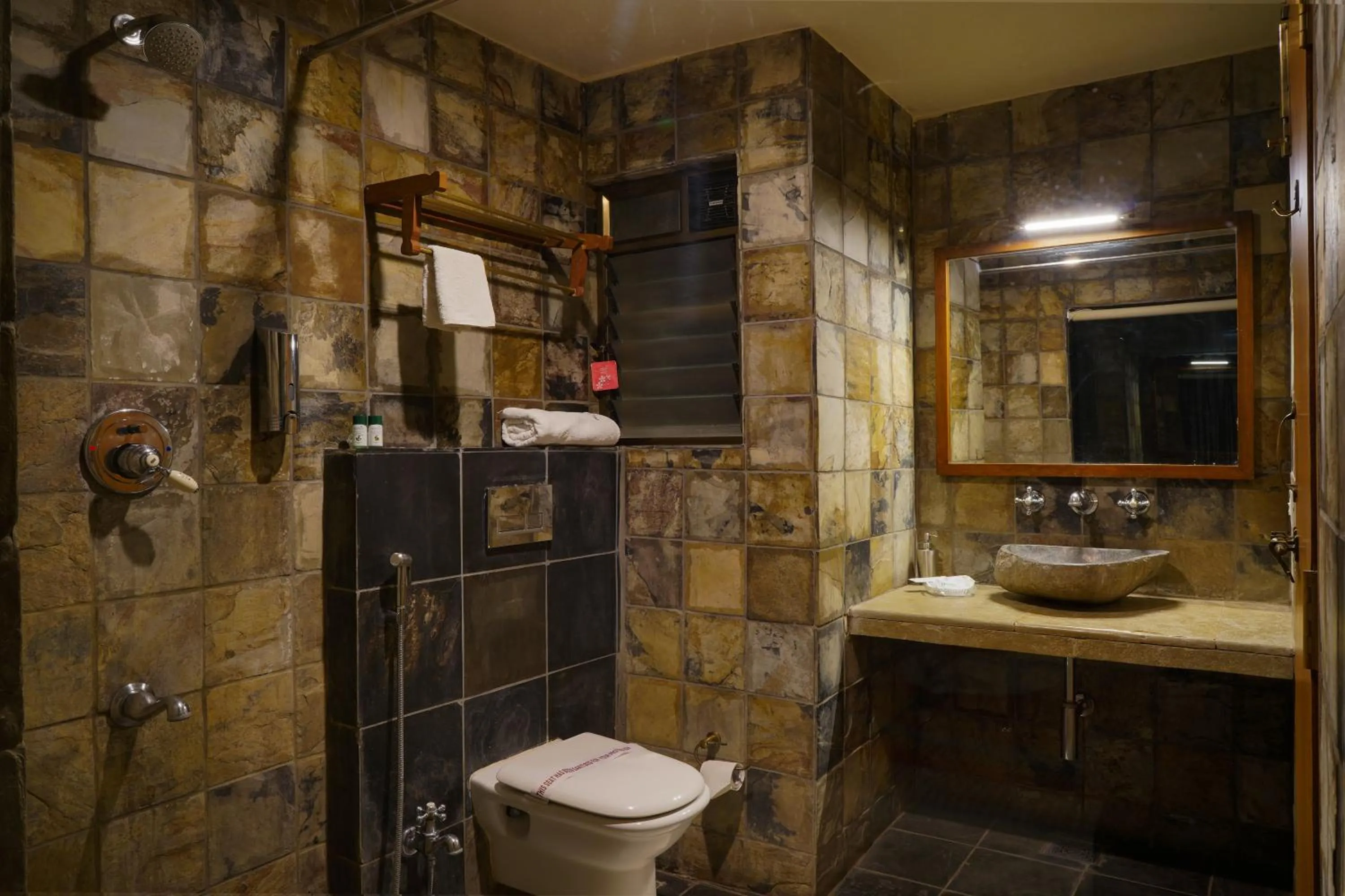 Bathroom in Nisarg Resort