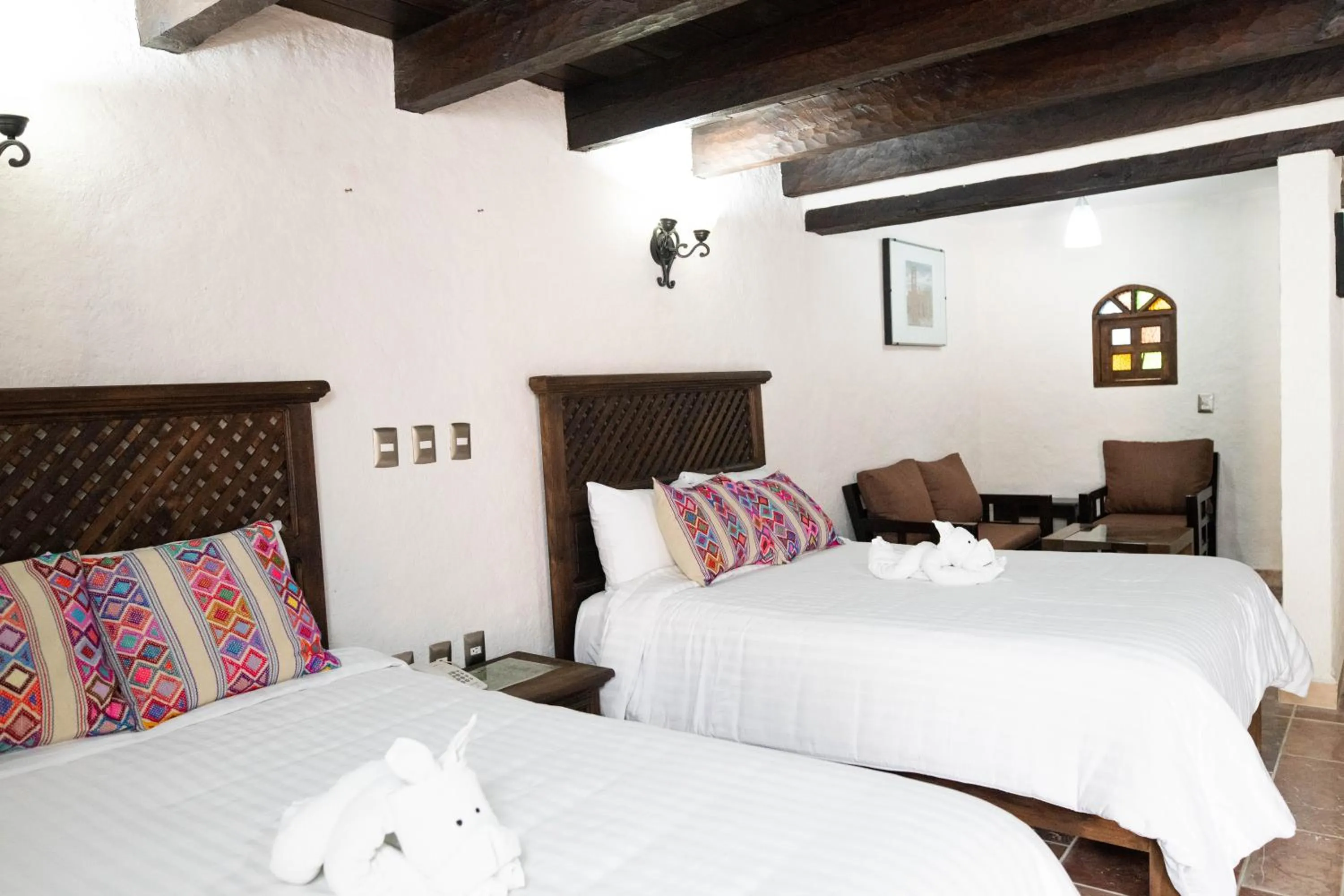 Bed in HOTEL PLAZA SAN CRISTOBAL INN