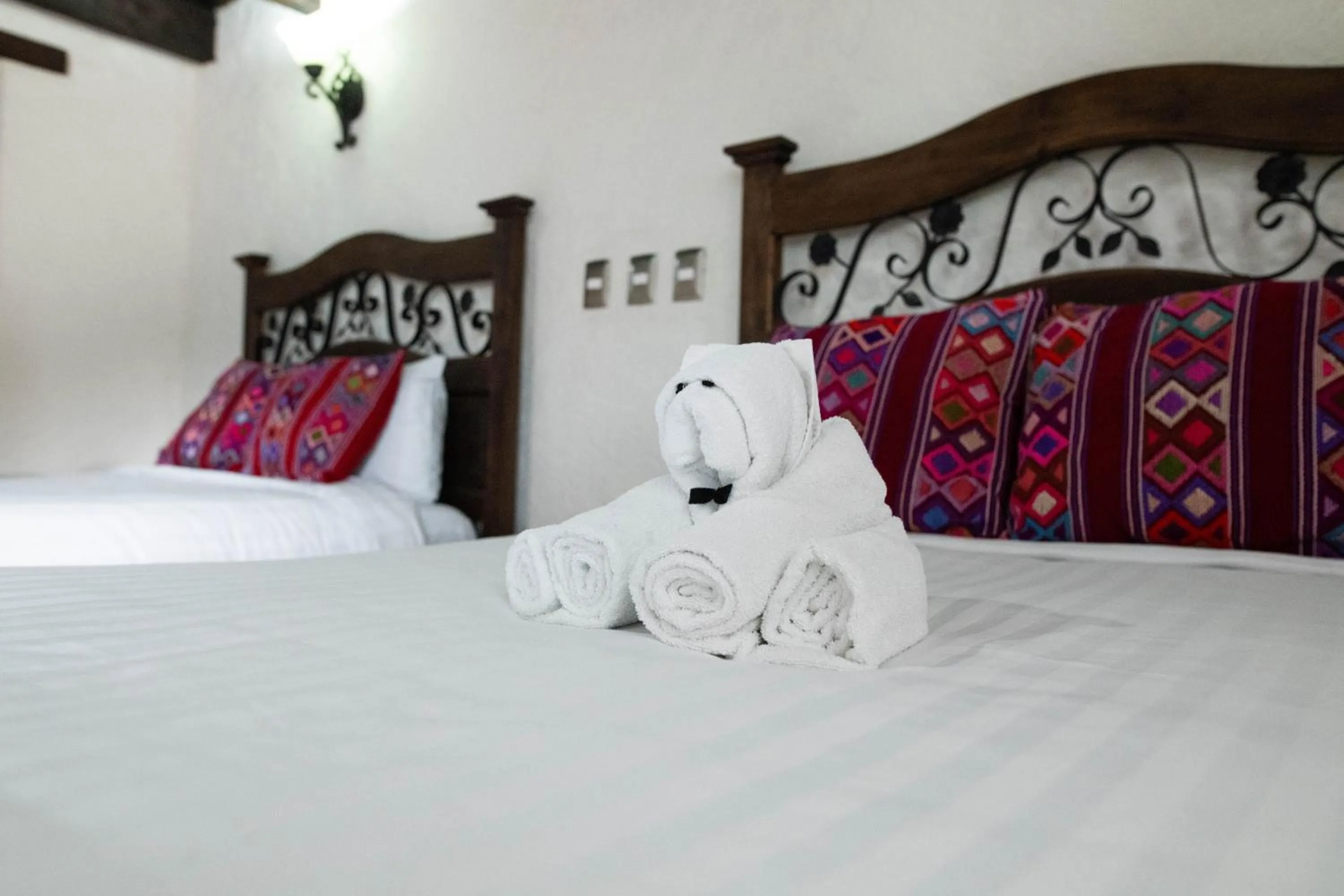Bed in HOTEL PLAZA SAN CRISTOBAL INN