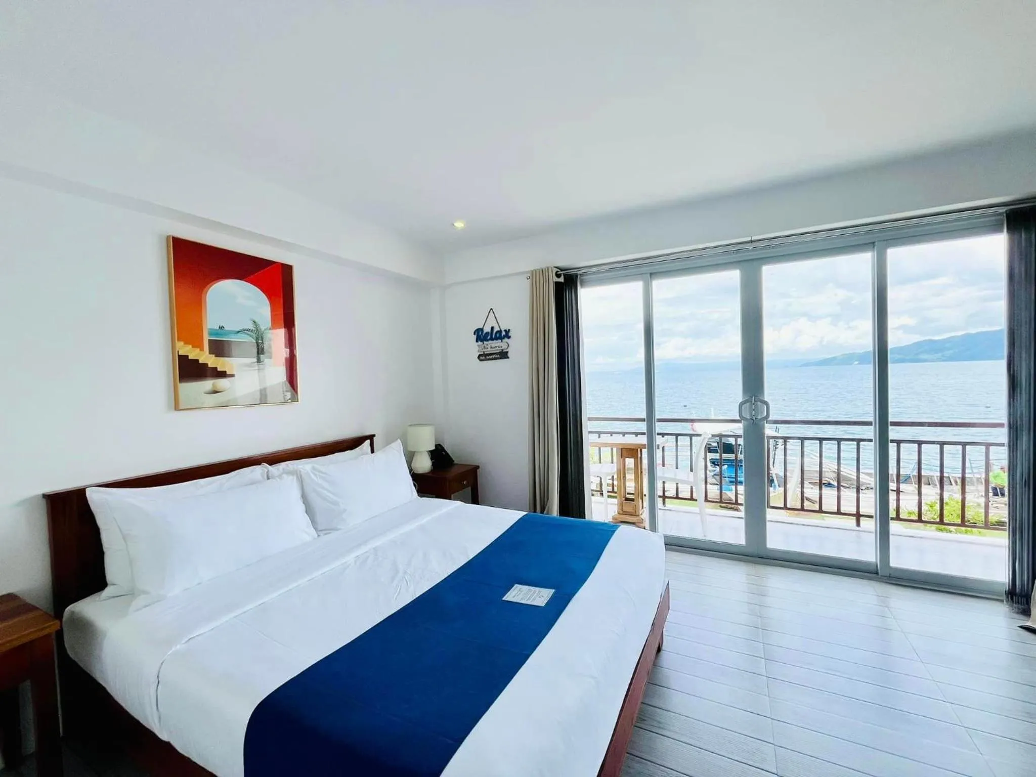 Deluxe Double Room with Balcony and Sea View in Porto Novo Anilao Dive and Leisure Resort