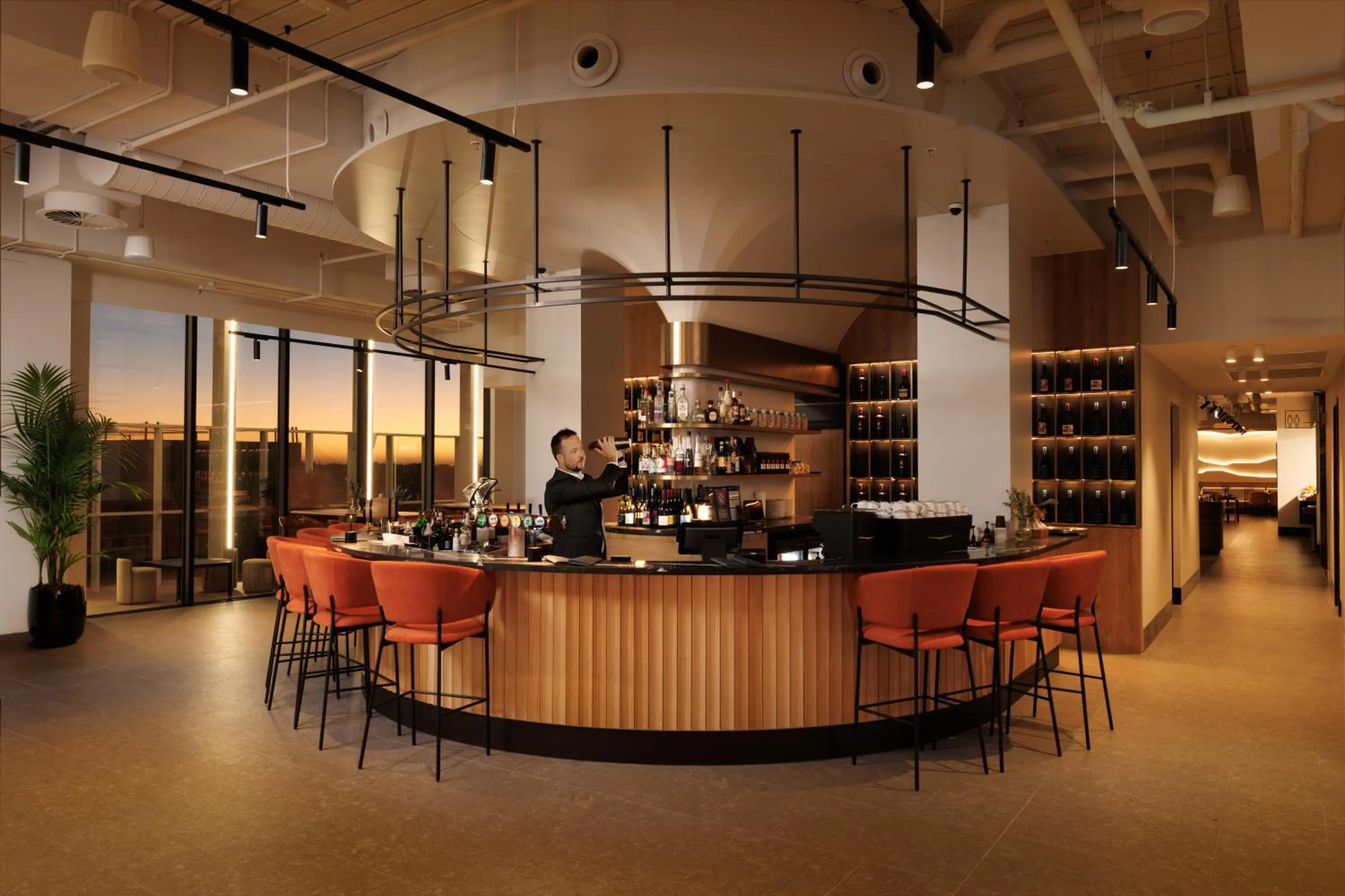 Lounge or bar in Crowne Plaza Adelaide Mawson Lakes by IHG