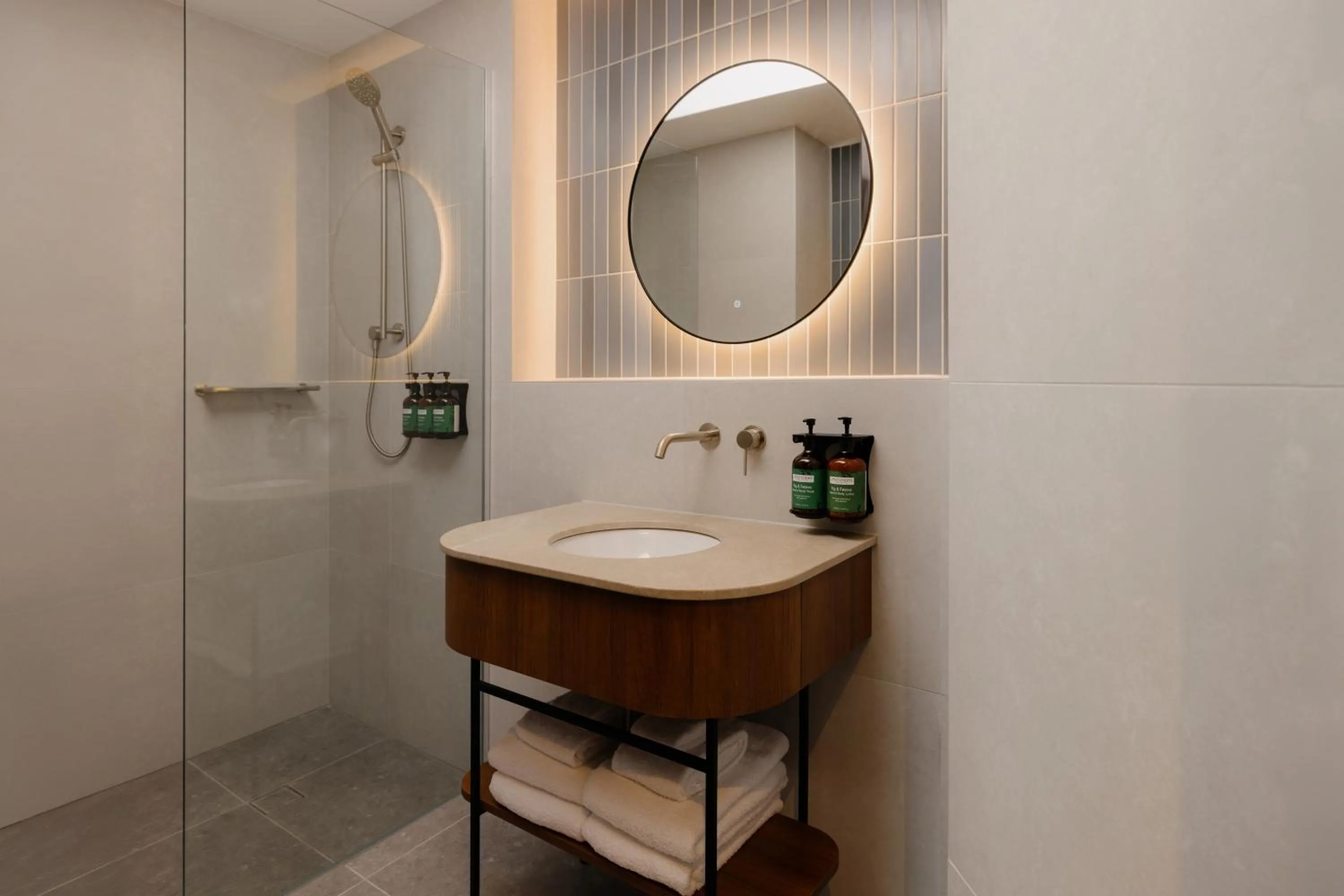 Bathroom in Crowne Plaza Adelaide Mawson Lakes by IHG
