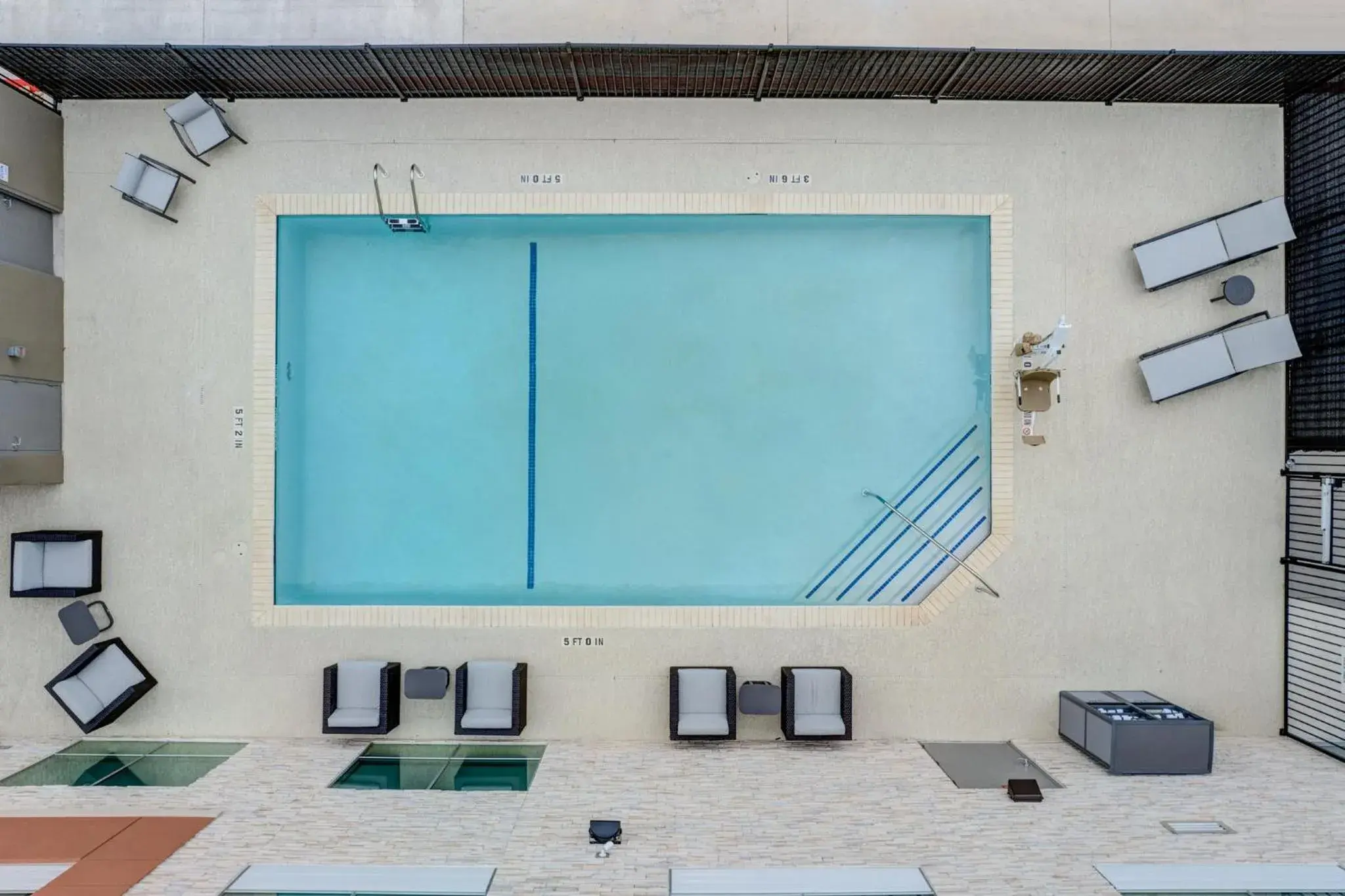 Swimming pool in Holiday Inn Express & Suites Austin Airport East by IHG Swimming pool in Holiday Inn Express & Suites Austin Airport East by IHG