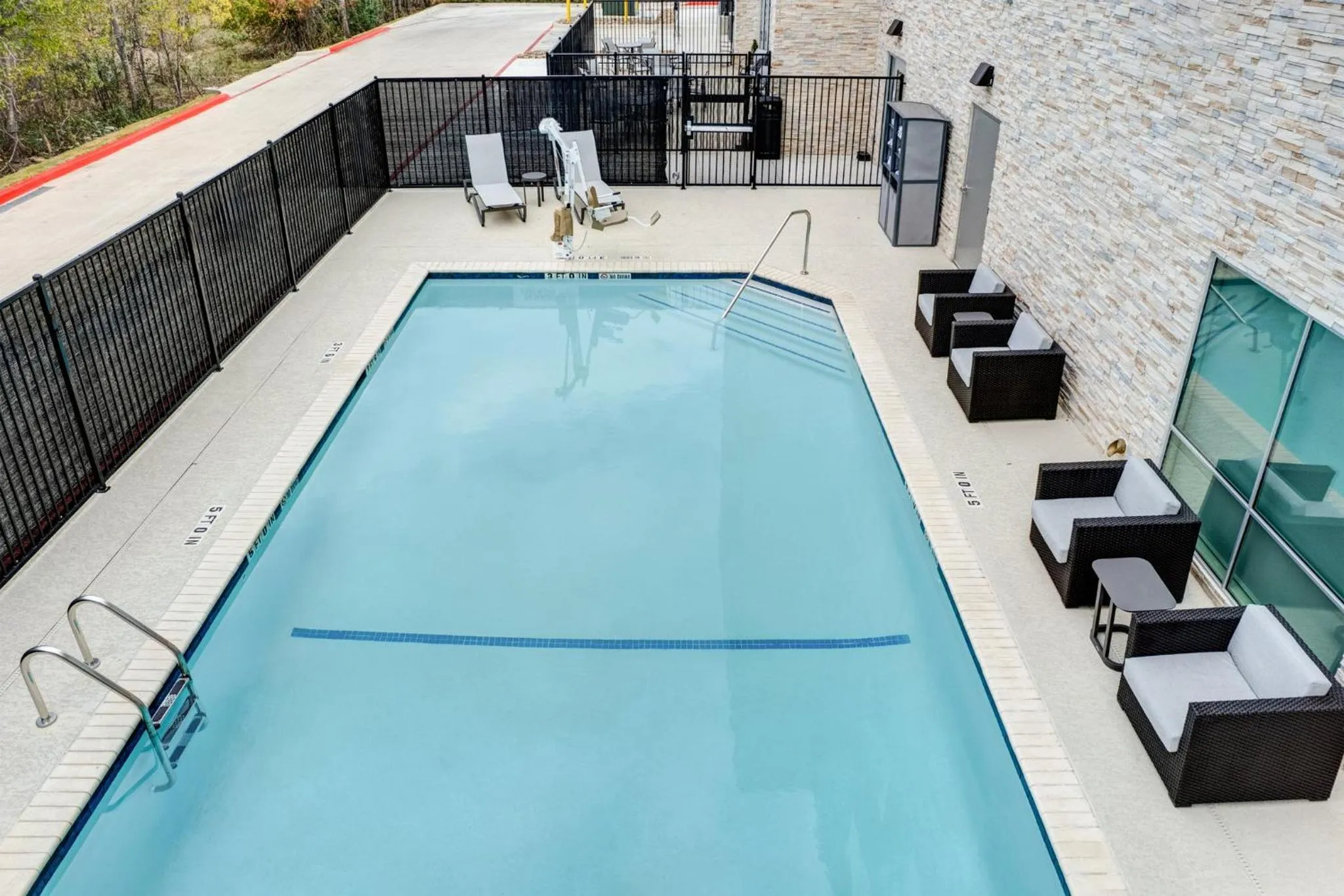 Swimming pool in Holiday Inn Express & Suites Austin Airport East by IHG