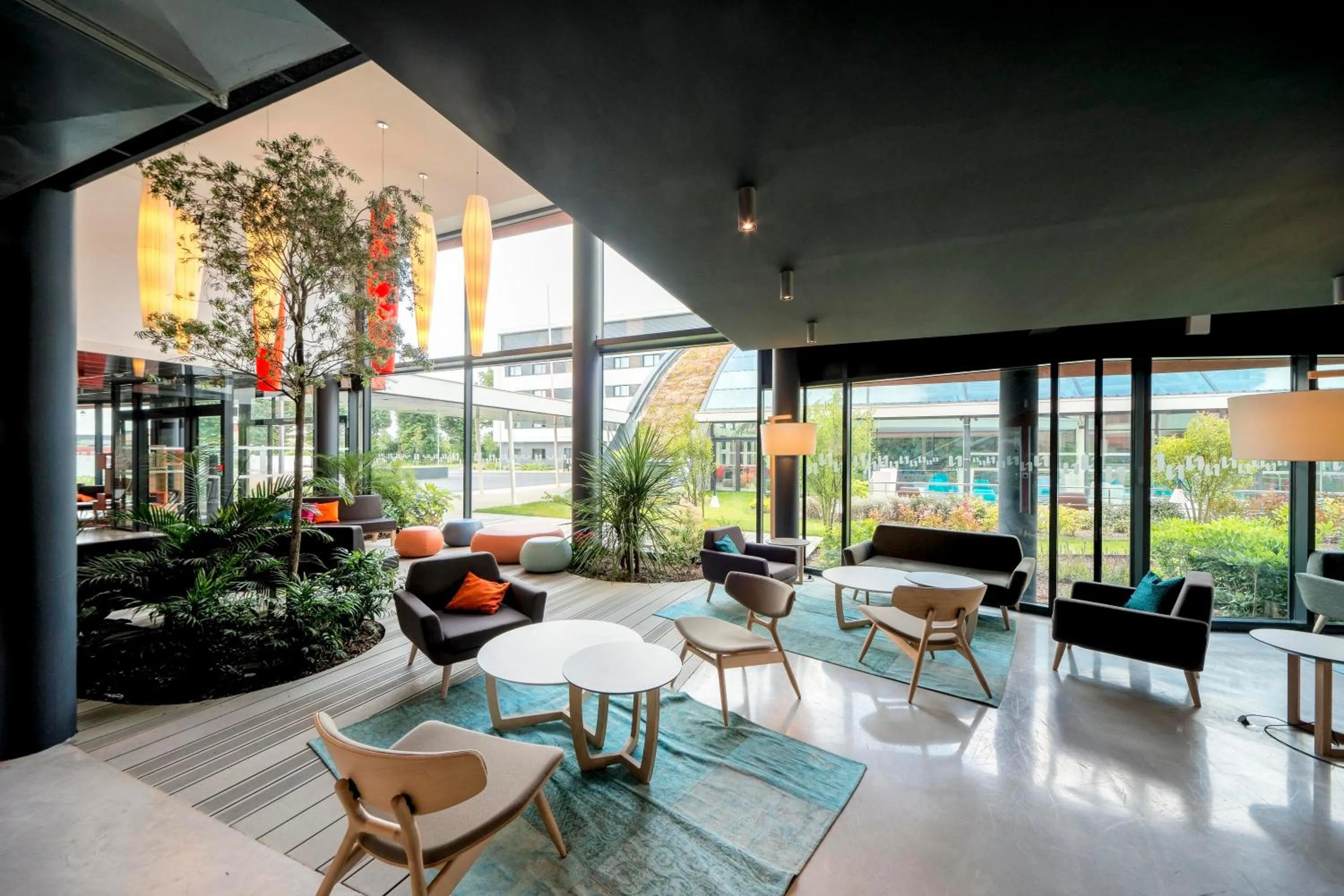 Lobby or reception in Nomad Paris Roissy CDG