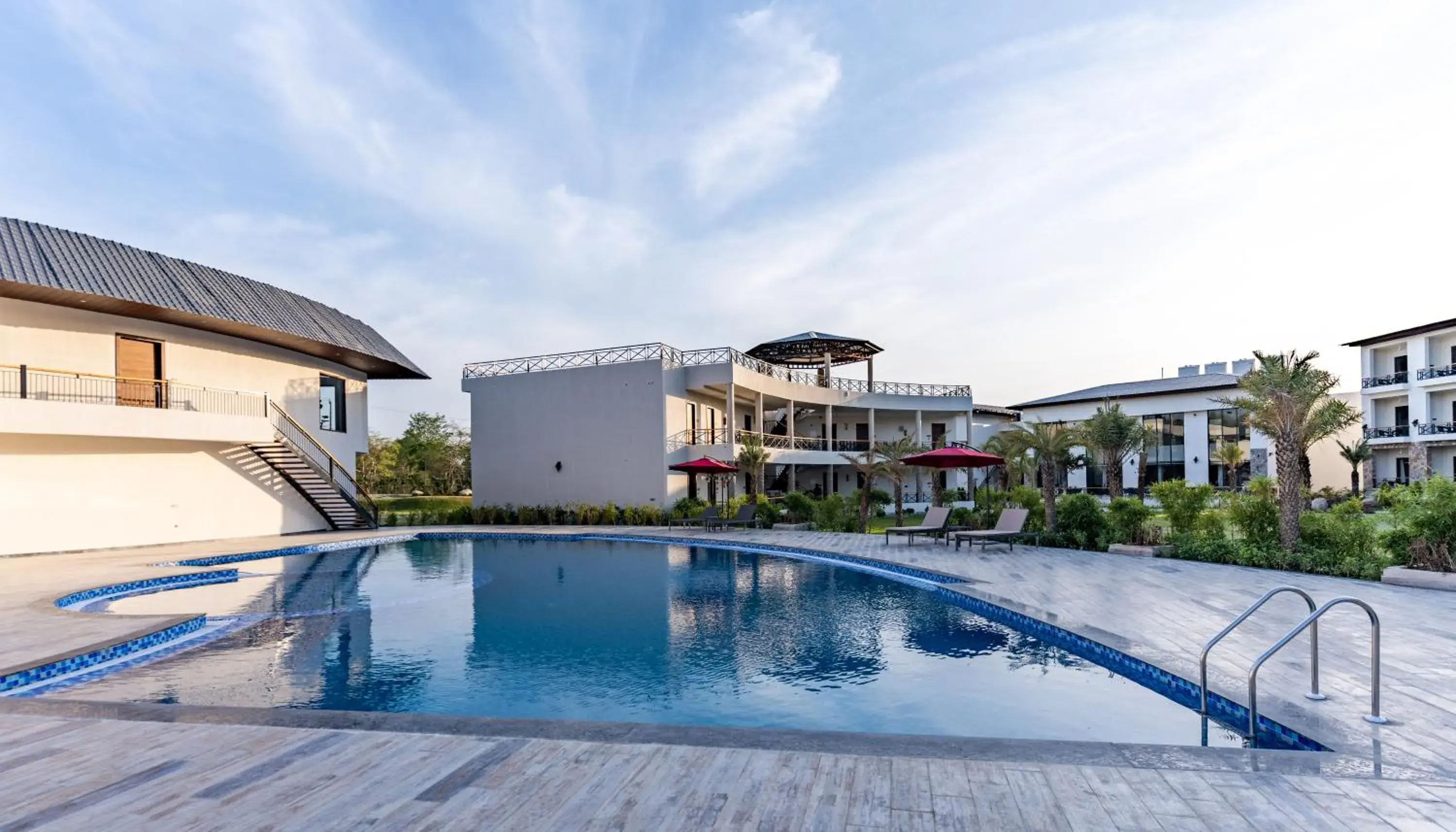 Swimming pool in Shervani Pebbles & Pines Resort & Spa, Corbett Swimming pool in Shervani Pebbles & Pines Resort & Spa, Corbett