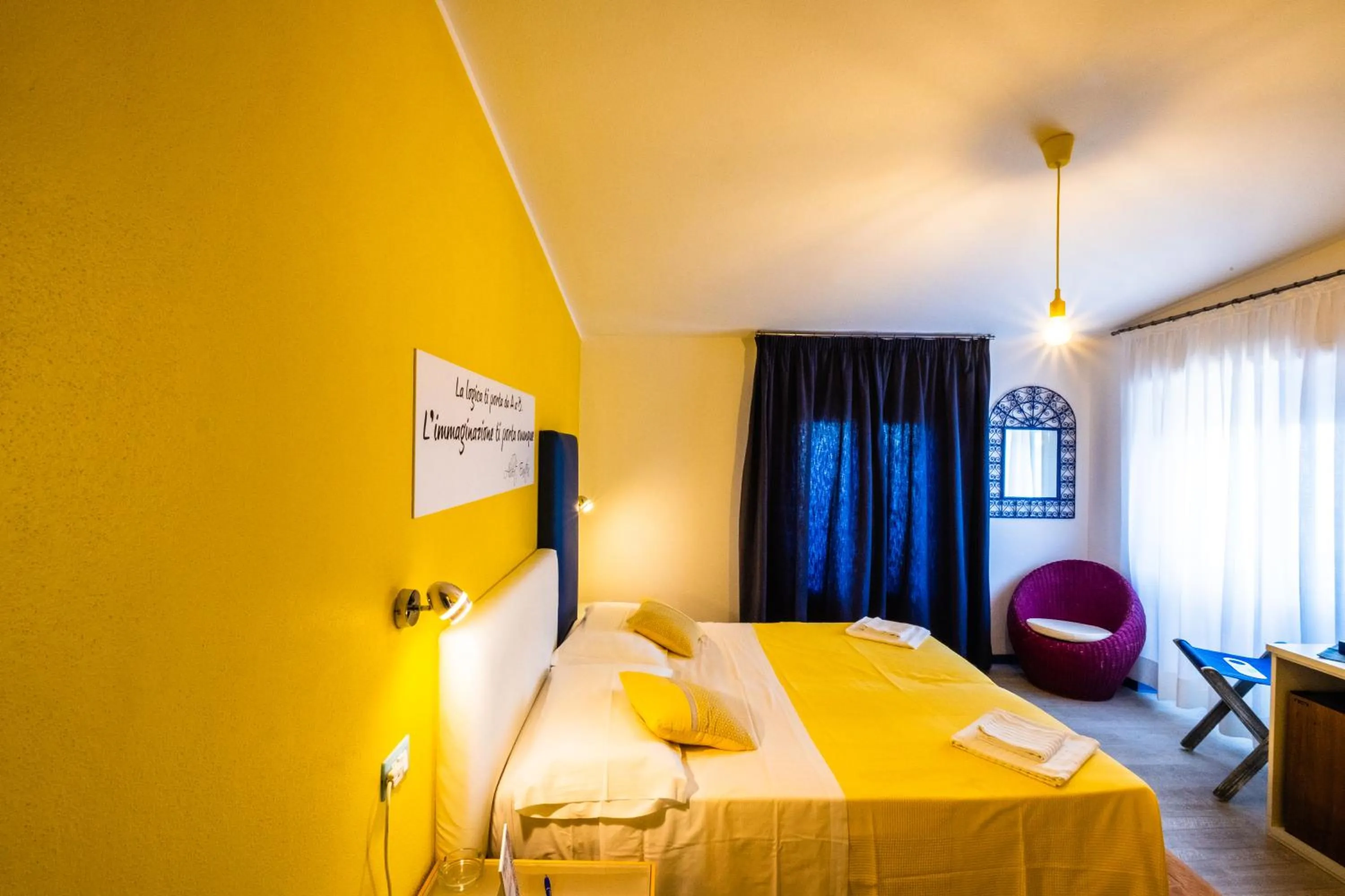 Bed in La Favorita Hotel