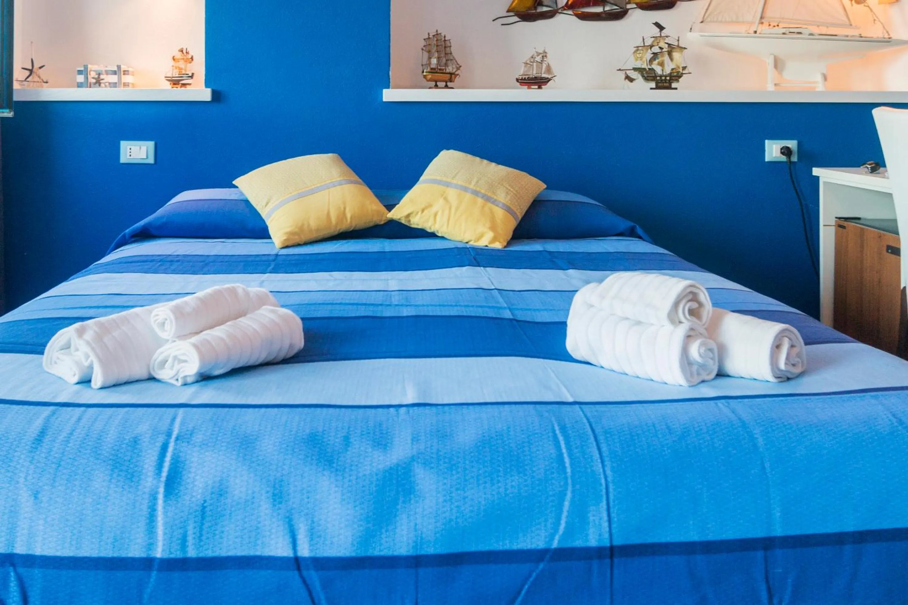 Bed in La Favorita Hotel