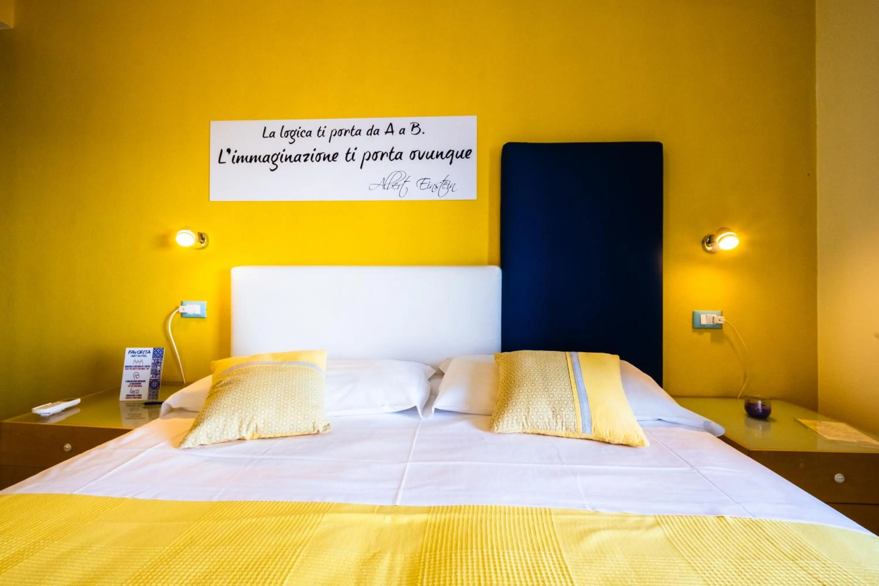 Bed in La Favorita Hotel