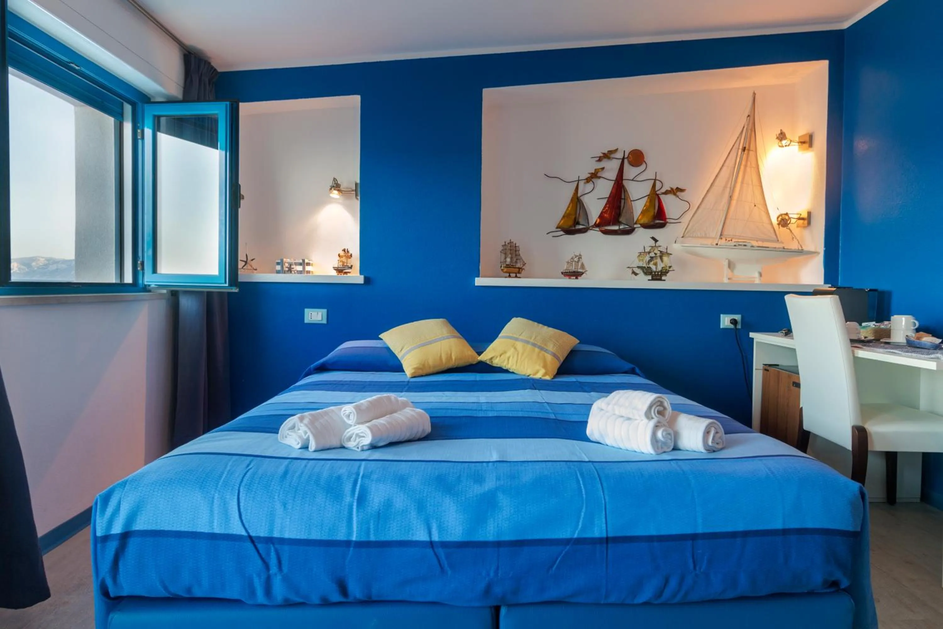 Bed in La Favorita Hotel