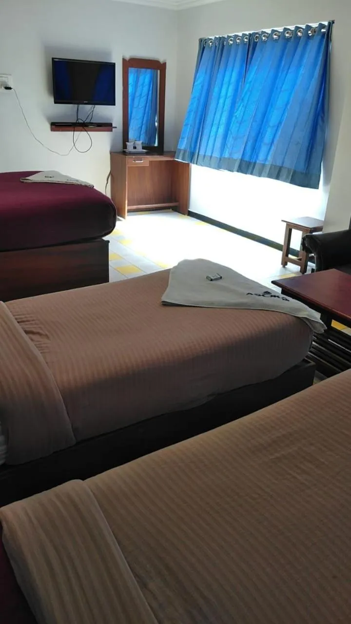 Bed in Asoka Inn