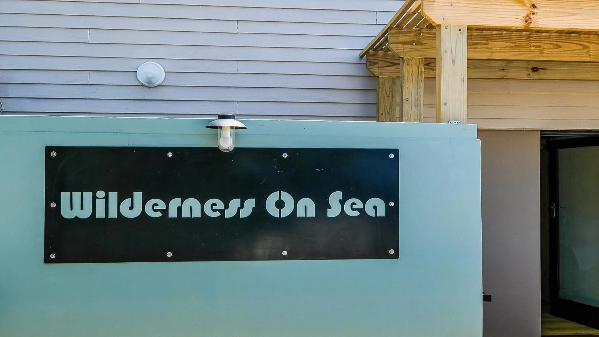 Property logo or sign in Wilderness on Sea