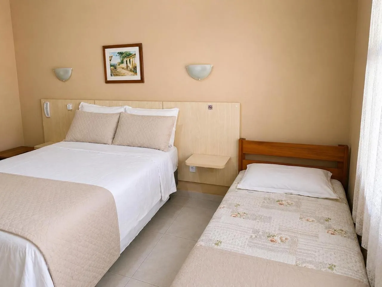 Bed in Vila Francesa Hotel