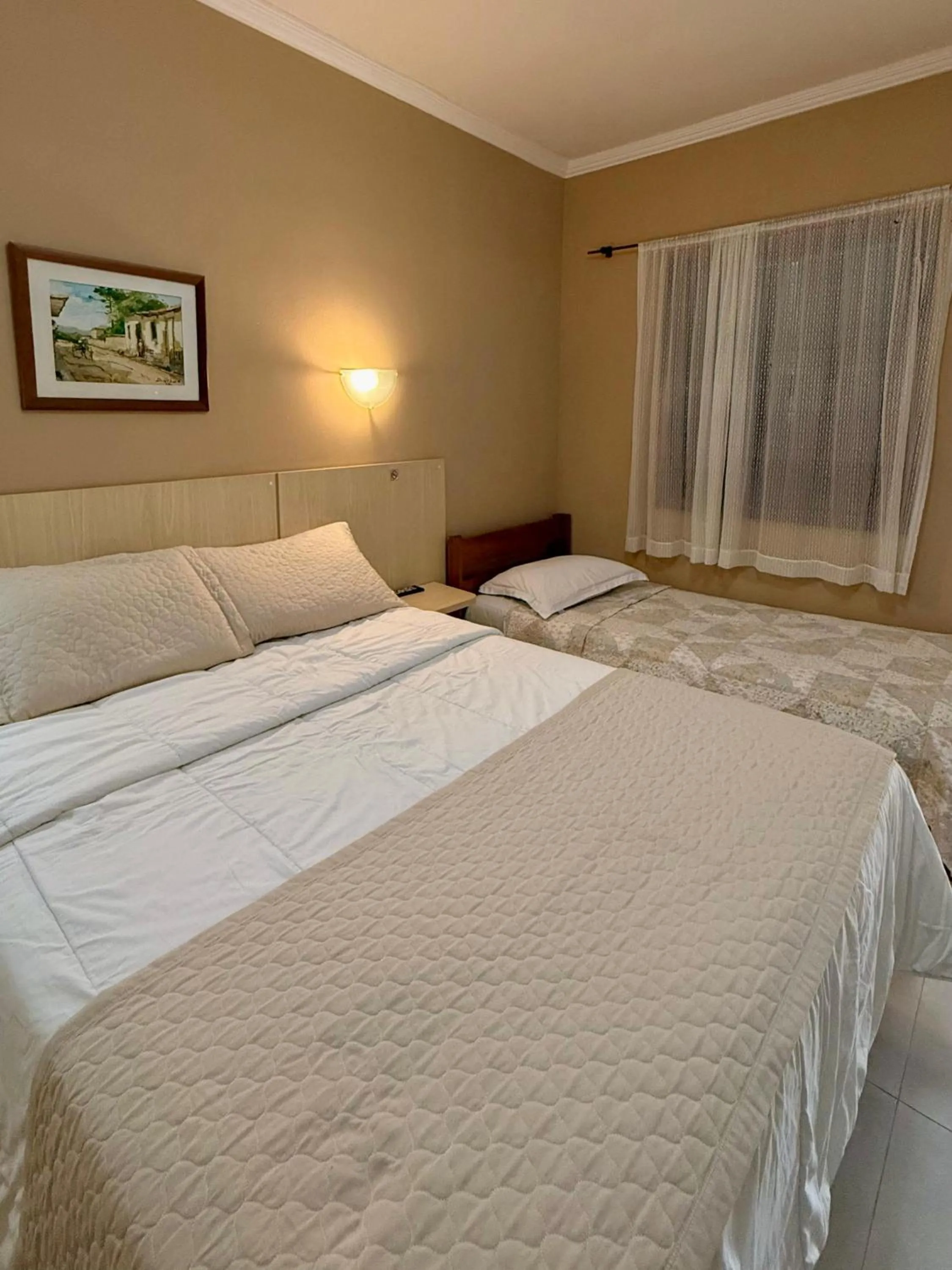 Bed in Vila Francesa Hotel