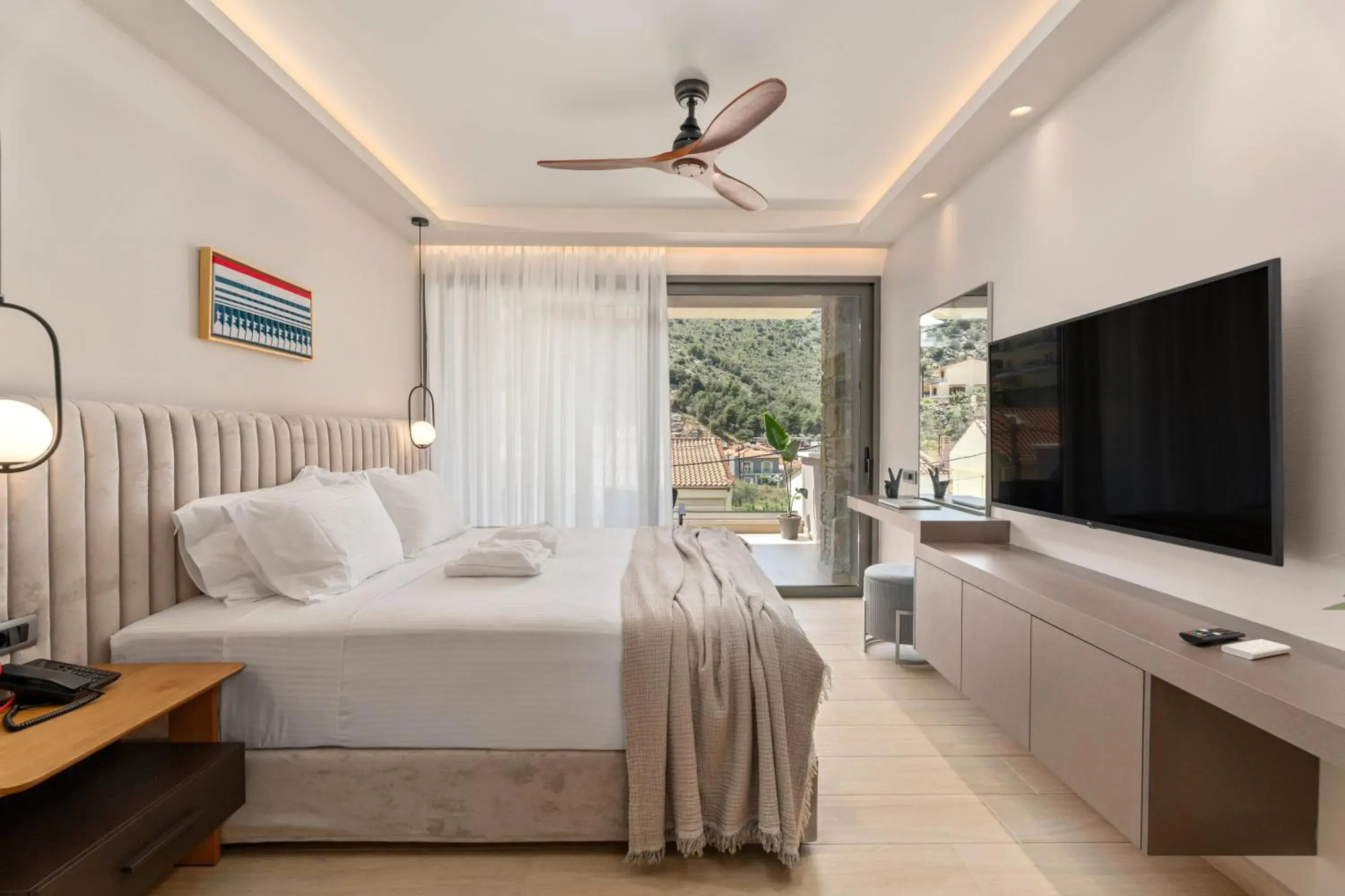 Bed in Ennea Muses Rooms and Suites Bed in Ennea Muses Rooms and Suites