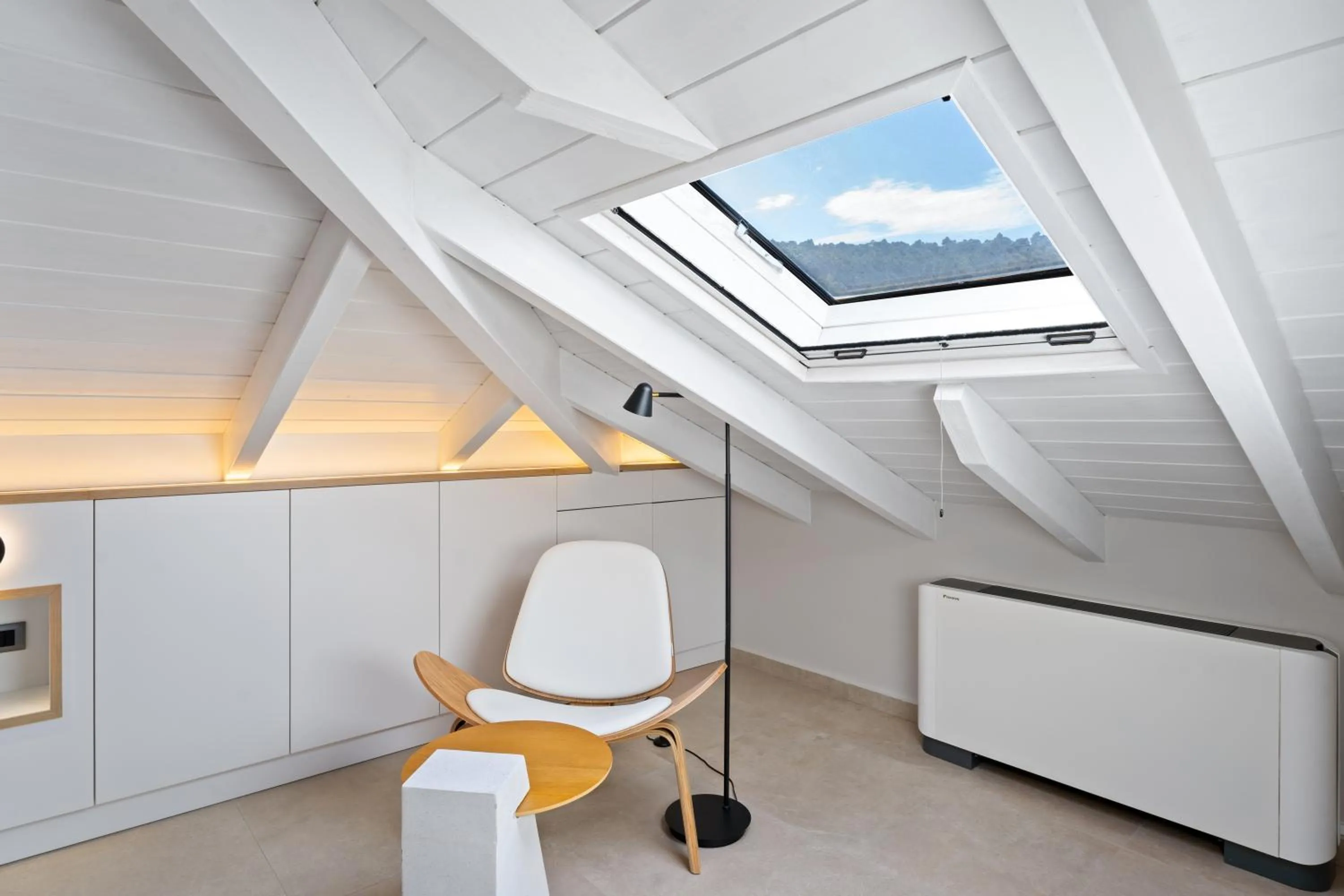 Seating area in Ennea Muses Rooms and Suites