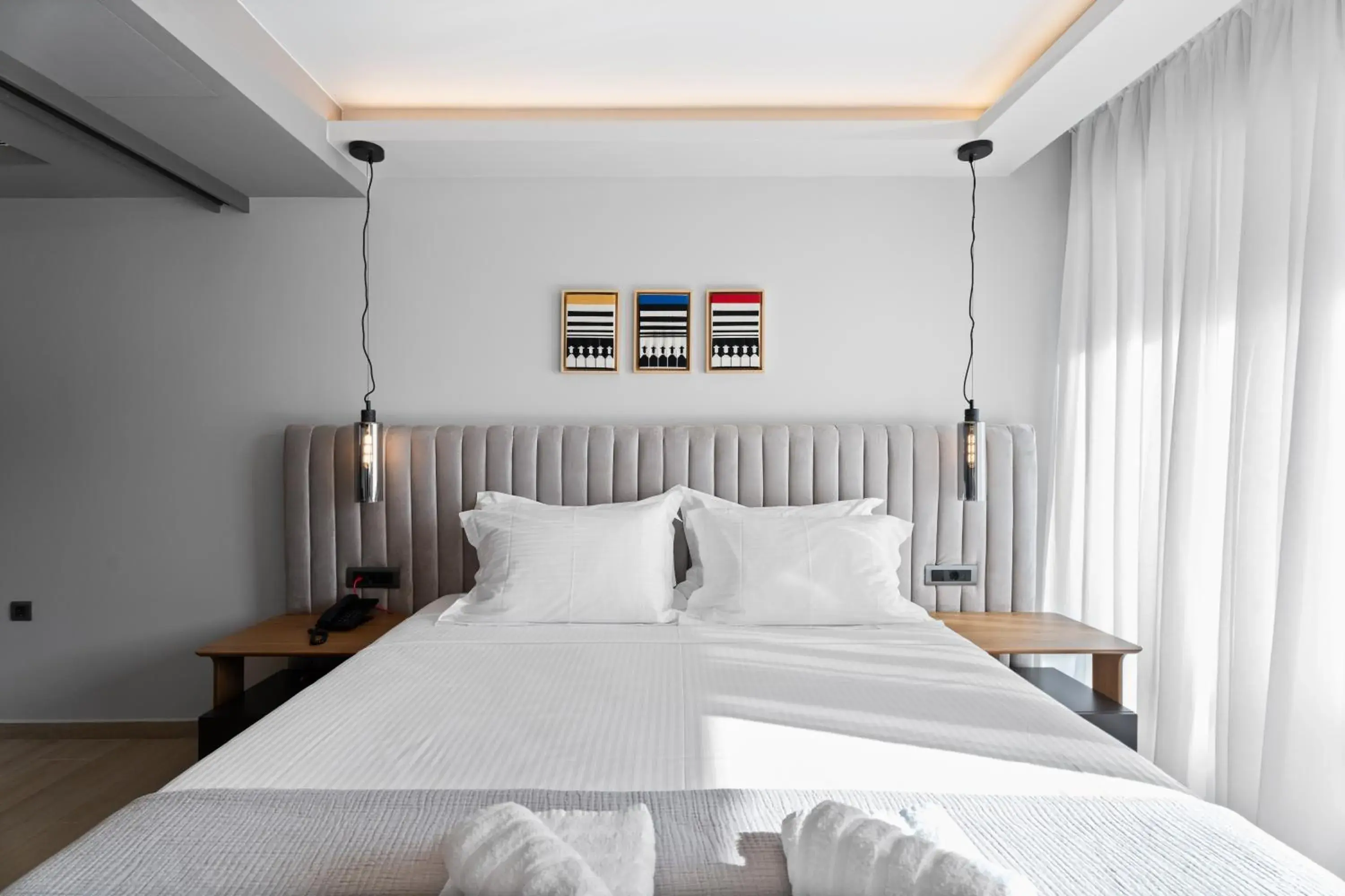 Bed in Ennea Muses Rooms and Suites Bed in Ennea Muses Rooms and Suites