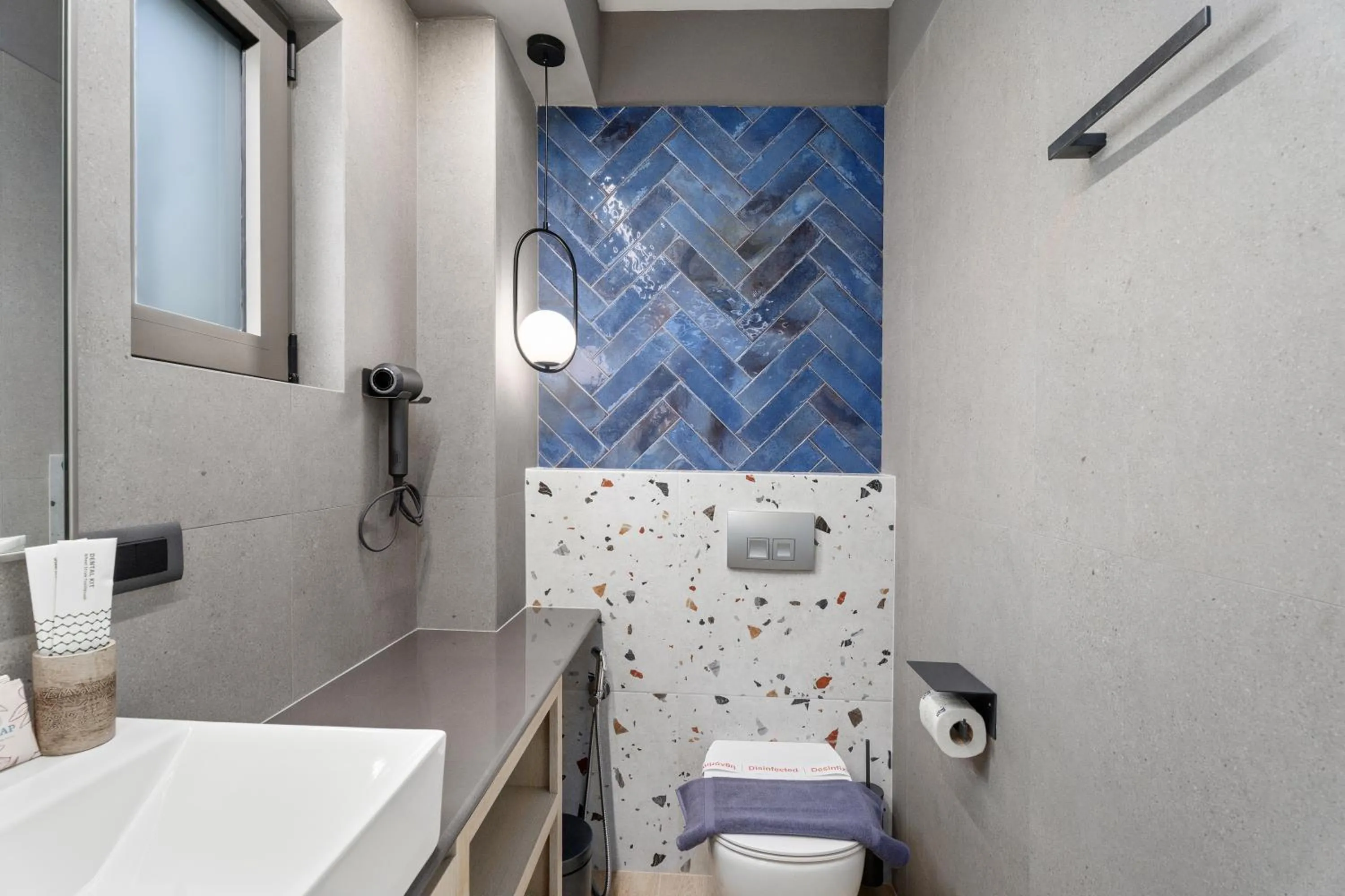 Toilet in Ennea Muses Rooms and Suites