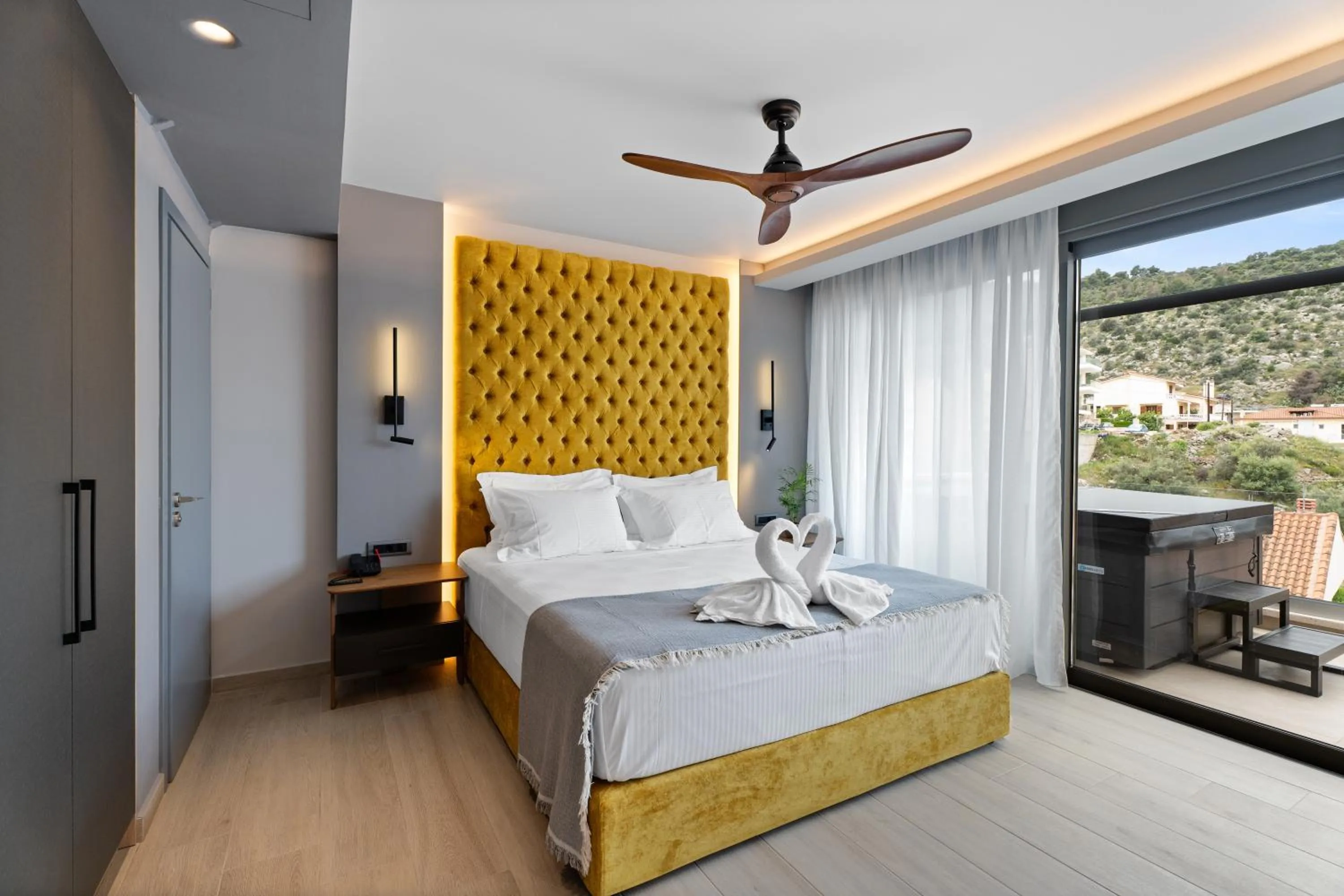 Bed in Ennea Muses Rooms and Suites