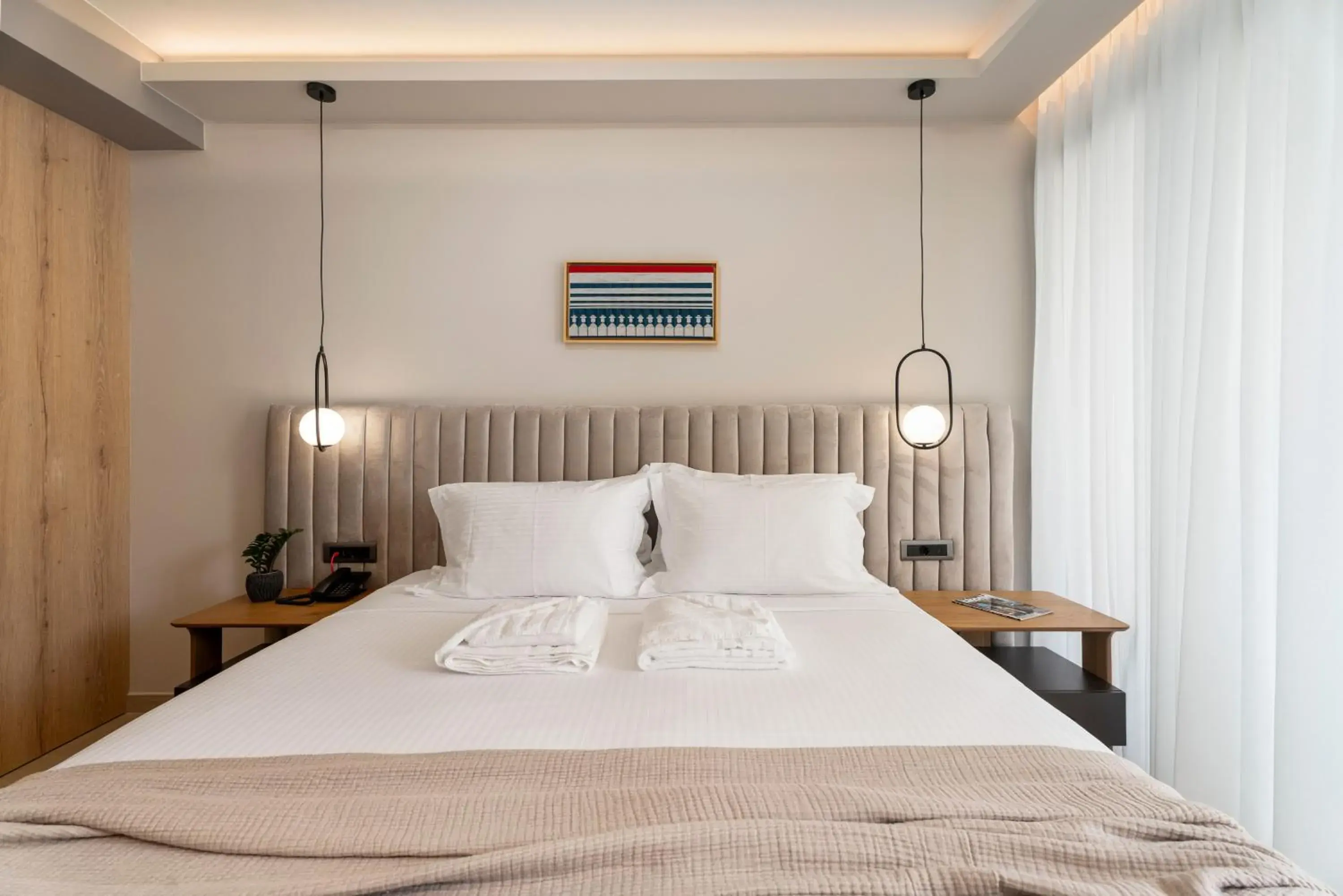 Bed in Ennea Muses Rooms and Suites Bed in Ennea Muses Rooms and Suites