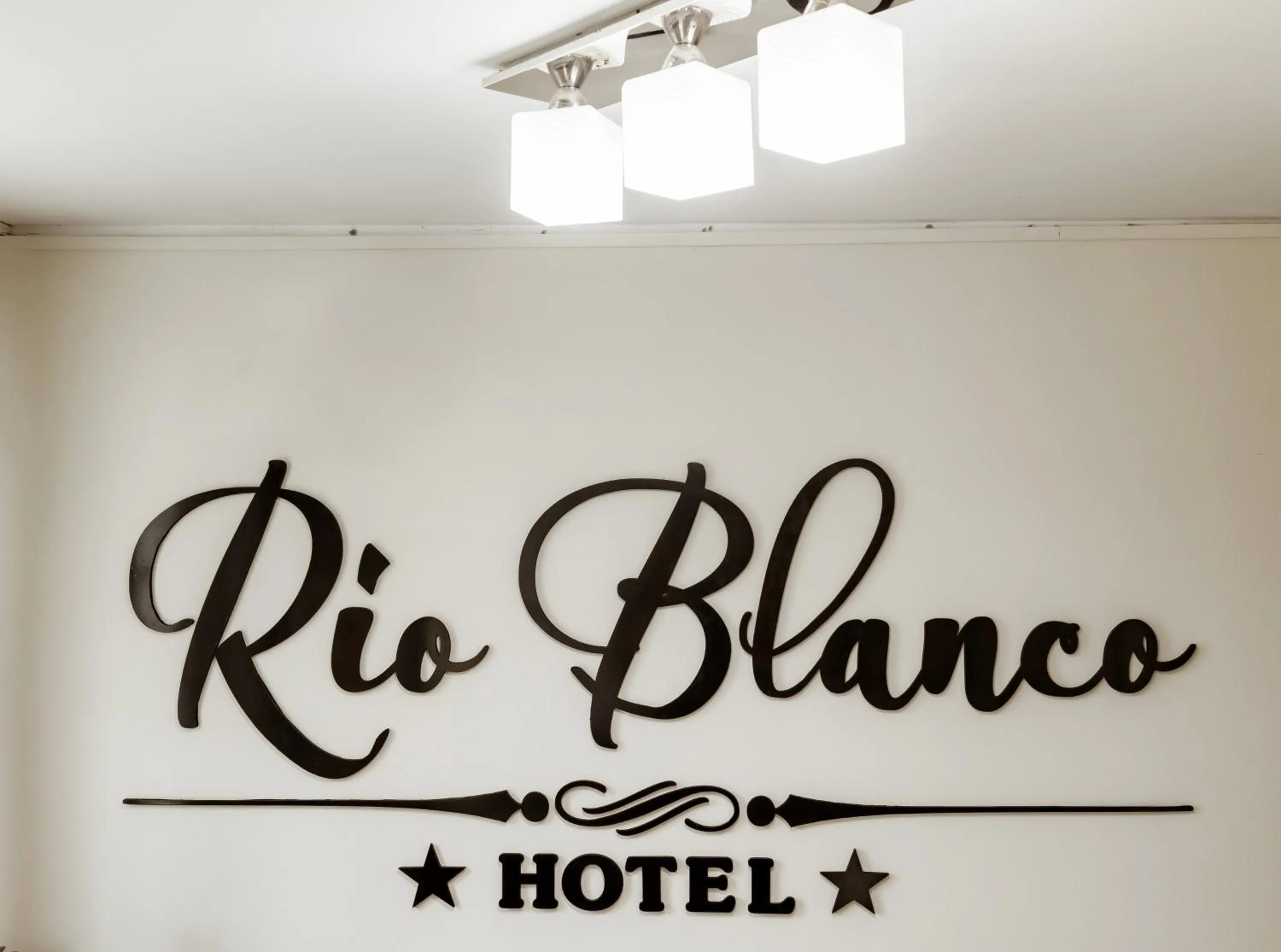 Property logo or sign in Hotel Rio Blanco