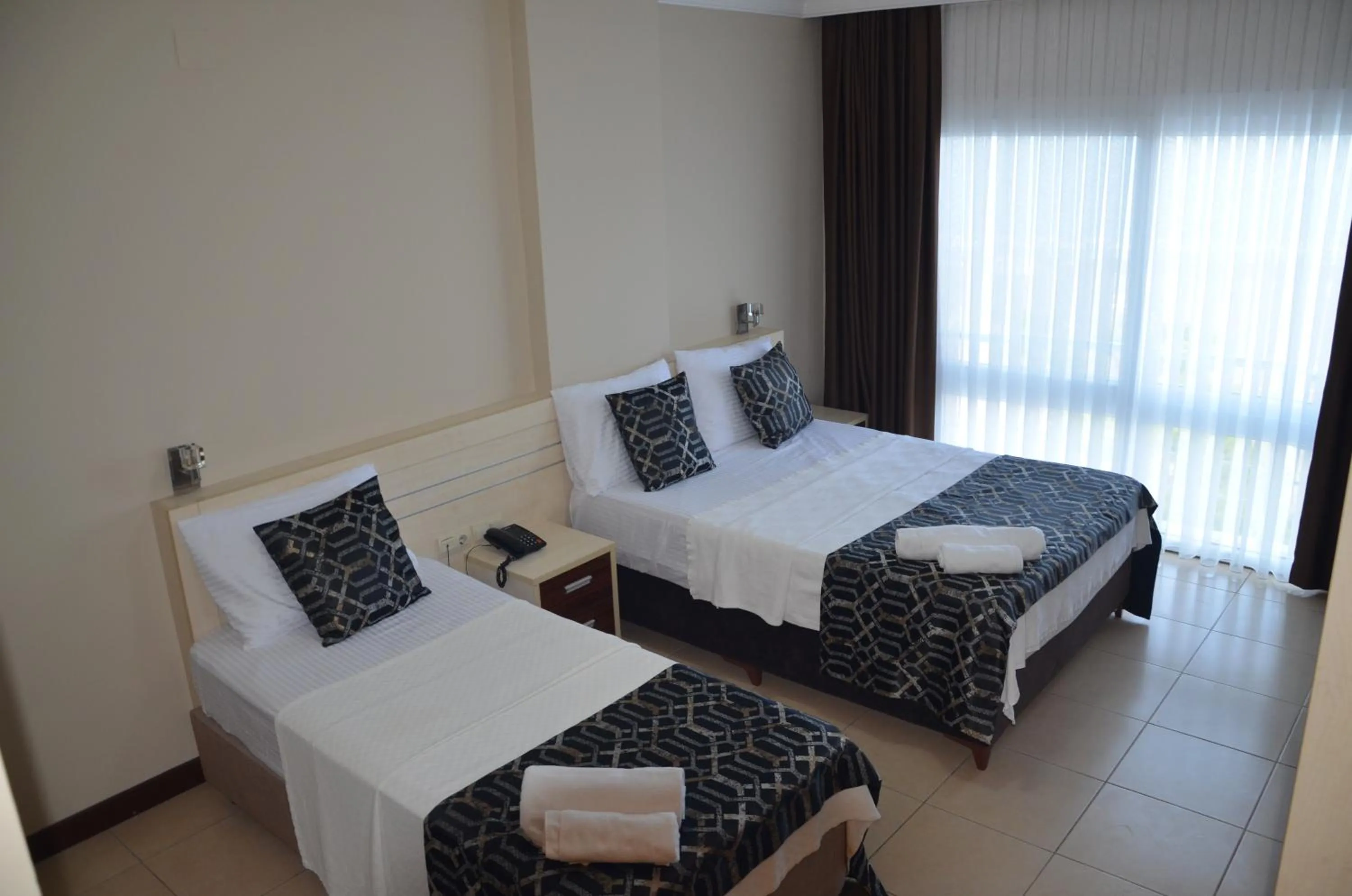 Bed in Denizkumu Hotel