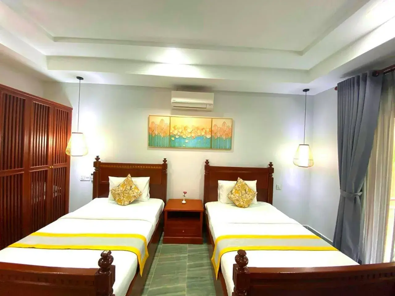 Bed in Ganesha Kampot Resort Bed in Ganesha Kampot Resort