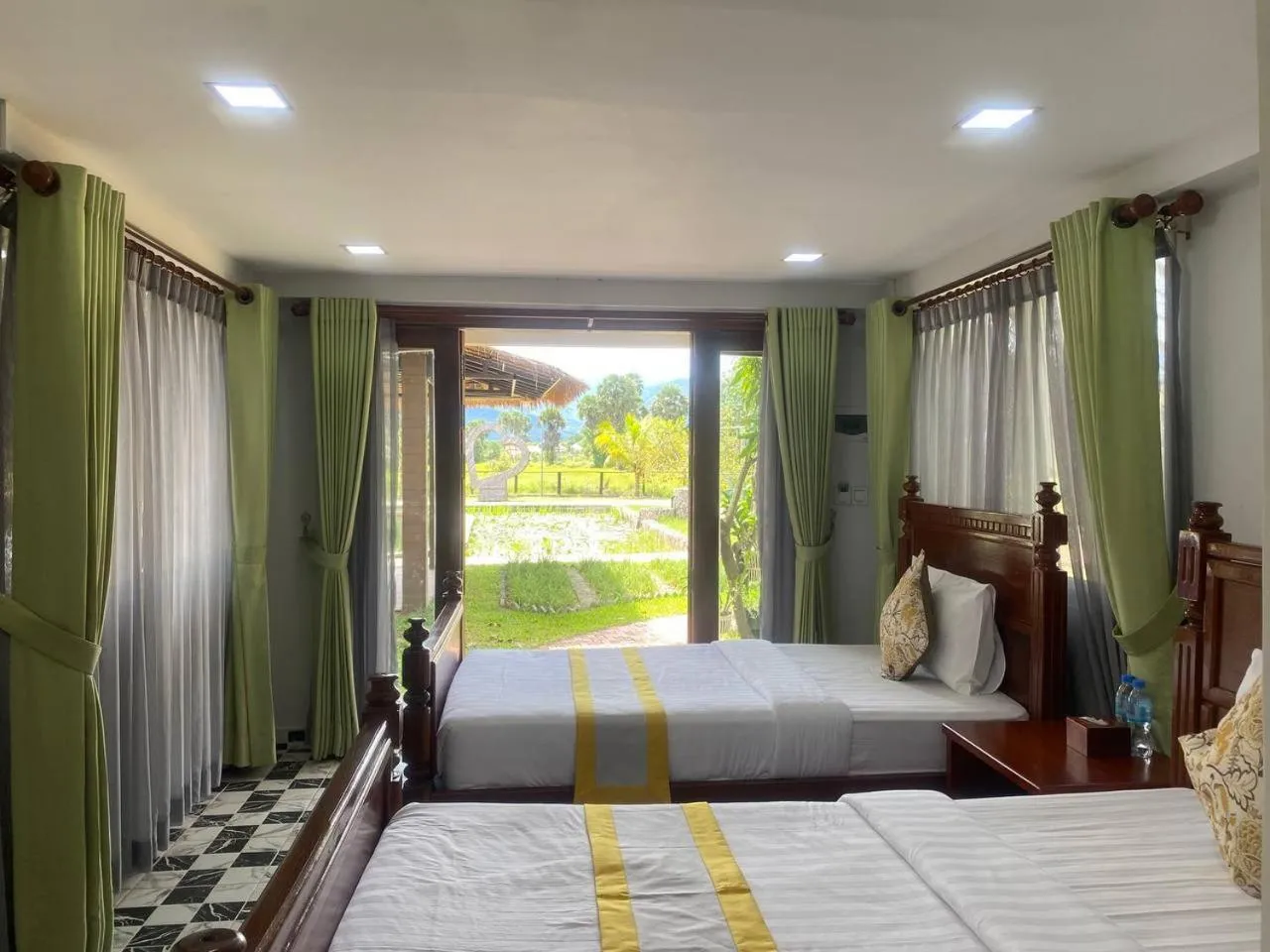 Bed in Ganesha Kampot Resort