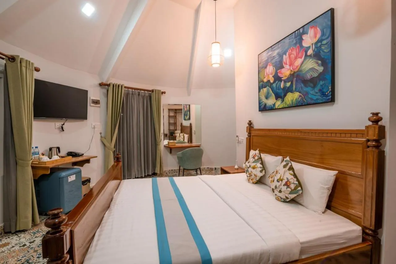 Bed in Ganesha Kampot Resort