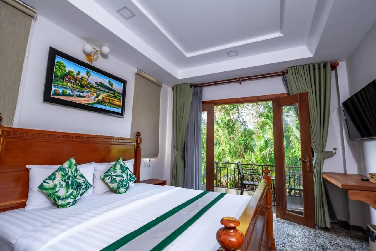 Bed in Ganesha Kampot Resort