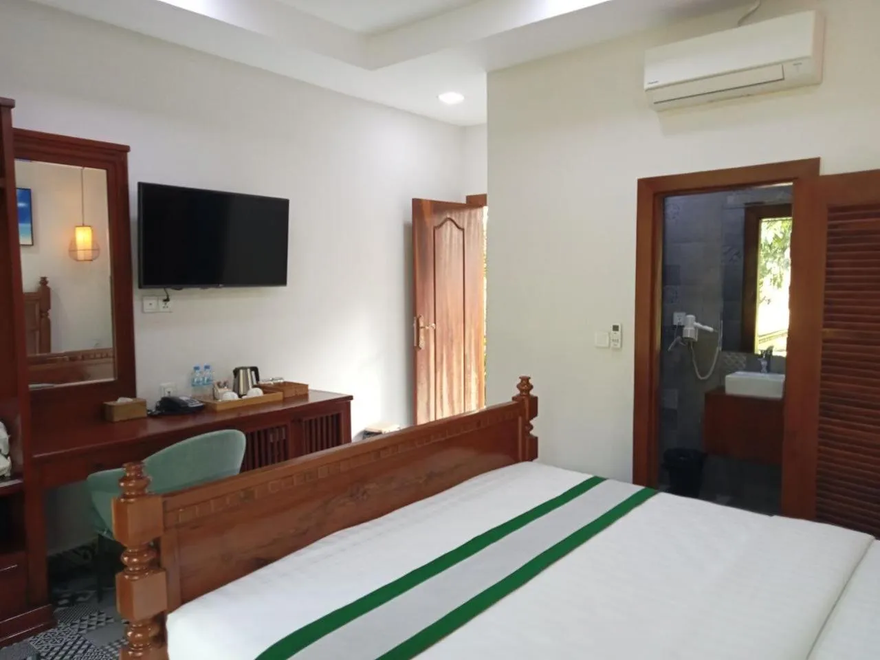 Bed in Ganesha Kampot Resort