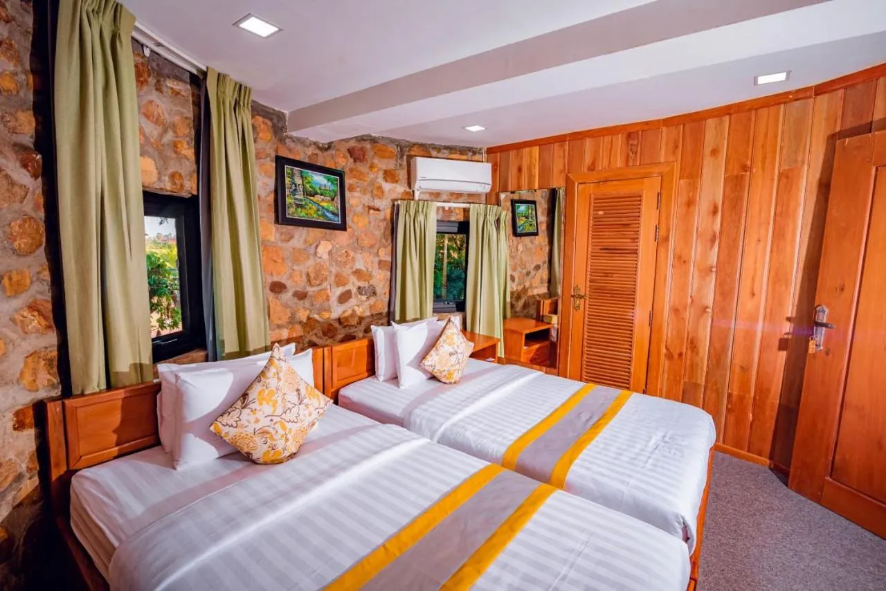 Bed in Ganesha Kampot Resort